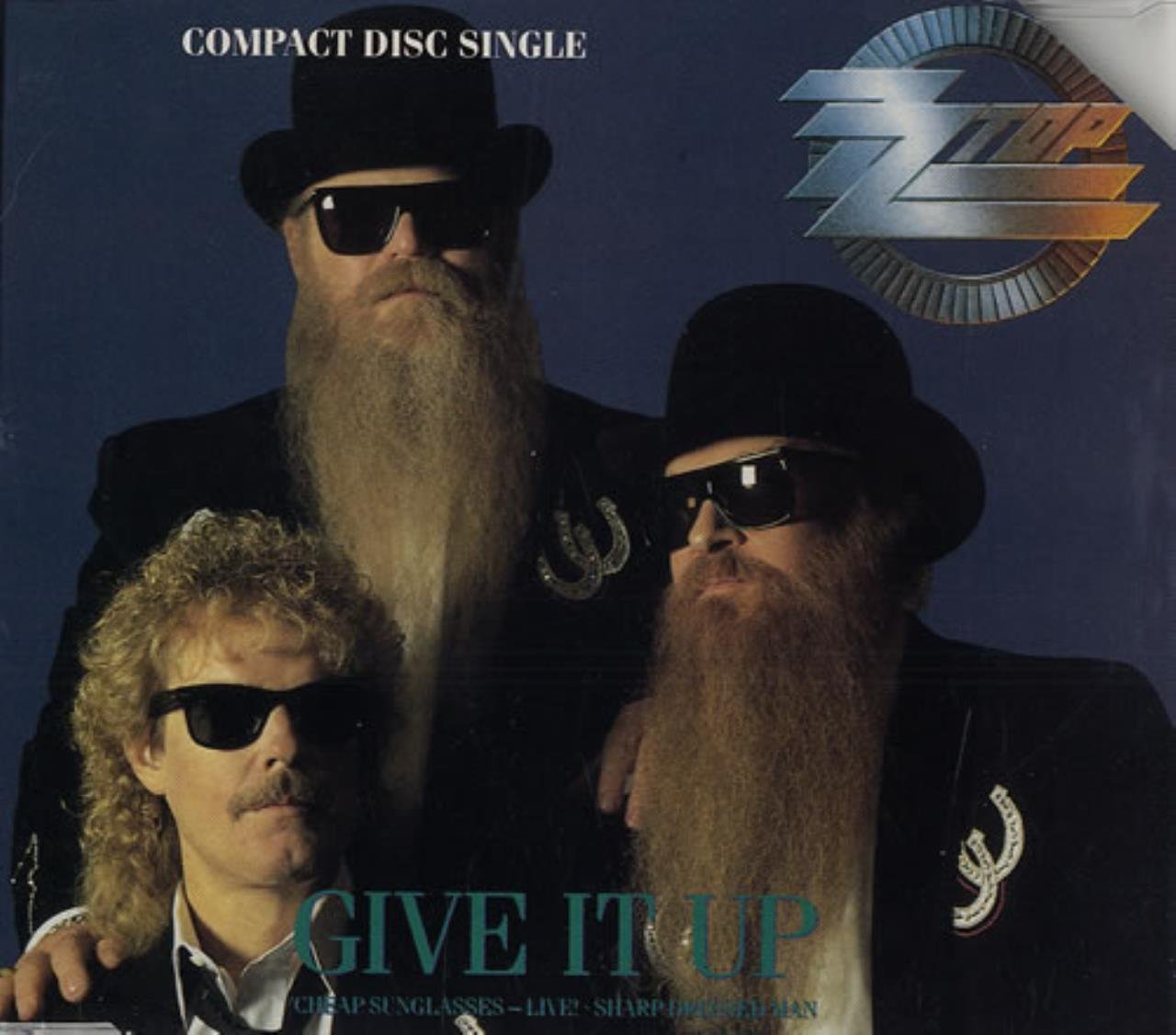 Give it up (plus 'Cheap sunglasses ', 'Sharp dressed man', 1990) Music