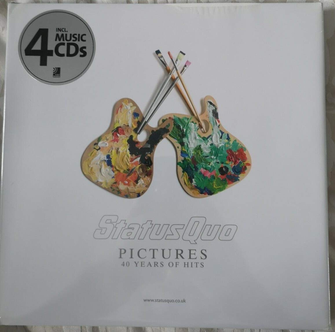 Status Quo Pictures: 40 Years Of Hits Metal & Hardrock