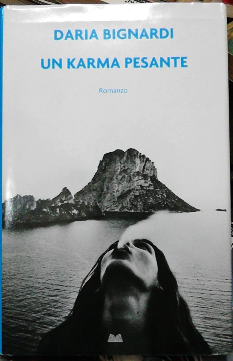 UN KARMA PESANTE (ed. Mondolibri) book