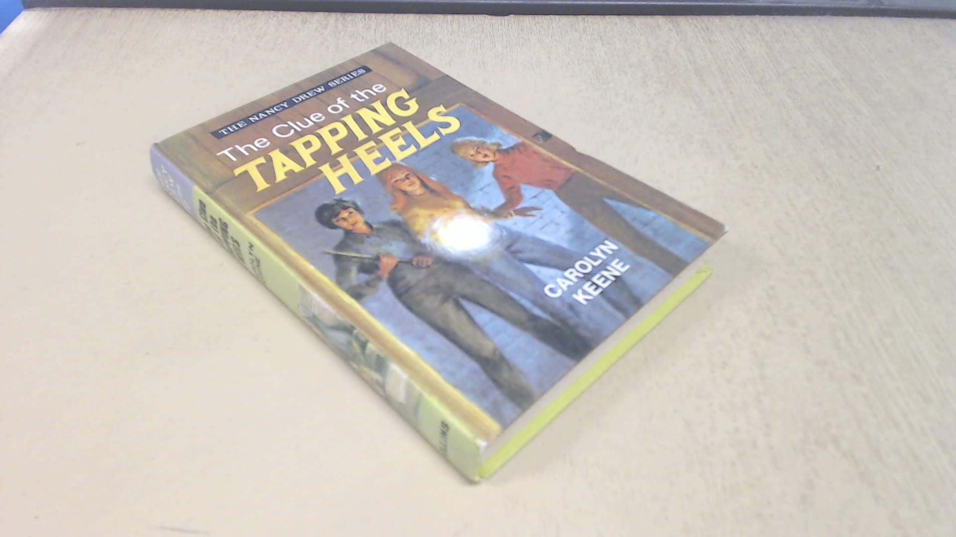 Clue of the Tapping Heels book