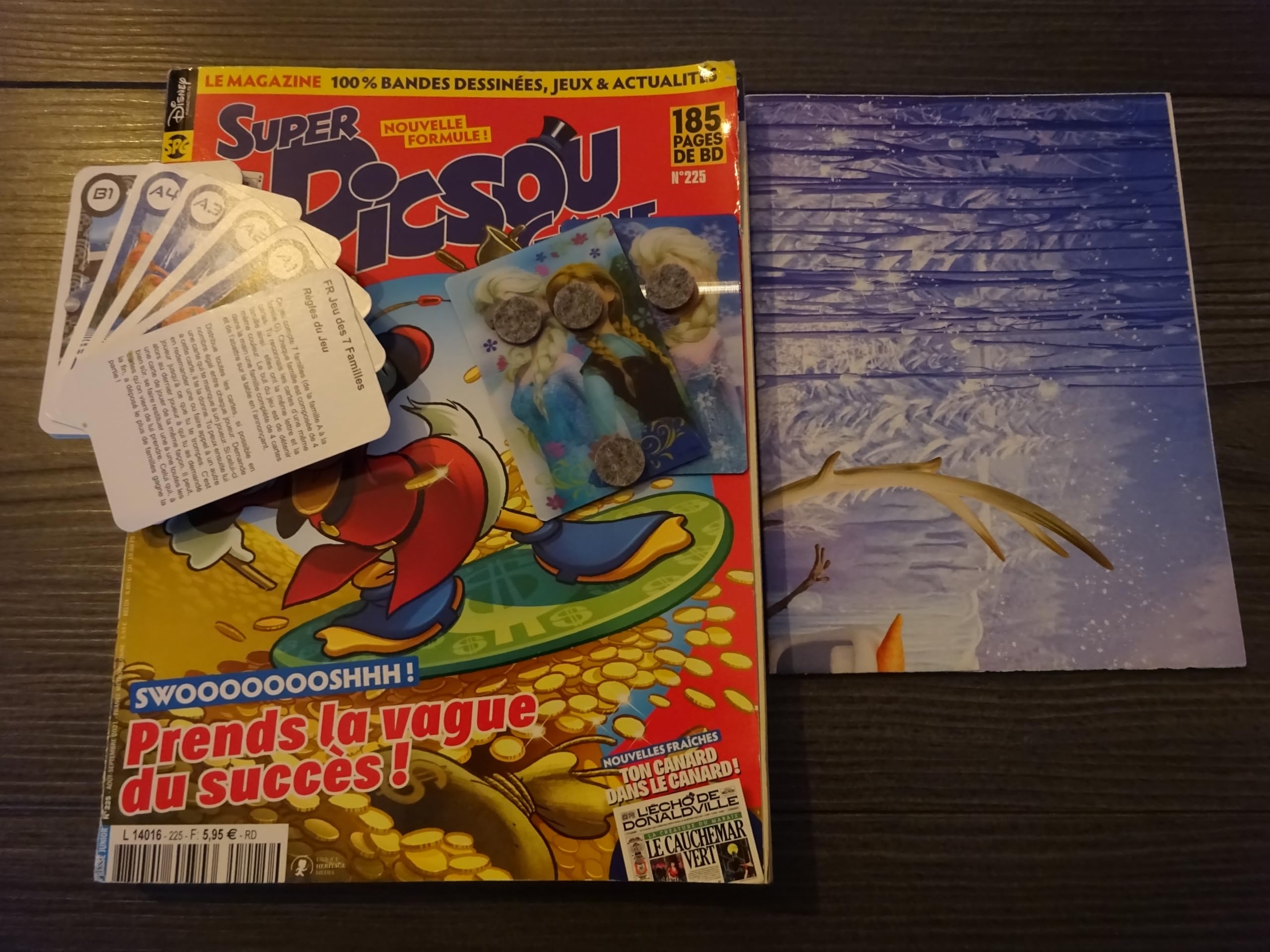 SUPER PICSOU GÉANT N°225 !! (NOUVELLE FORMULE) "SWOOOOOOOSHHH ! PRENDS LA VAGUE DU SUCCES !" 185 PAGES DE BD (EN CADEAU : TON JEU DE CARTES DES 7 FAMILLES CARS 2 + TON POSTER & TES 2 MAGNETS FROZEN) book