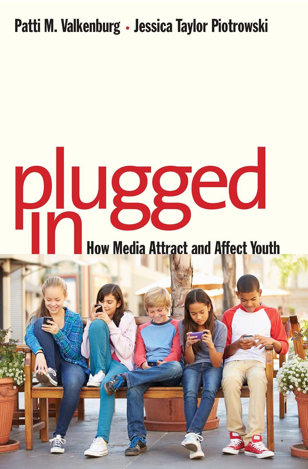 Plugged In: How Media Attract and Affect Youth Media & Communication
