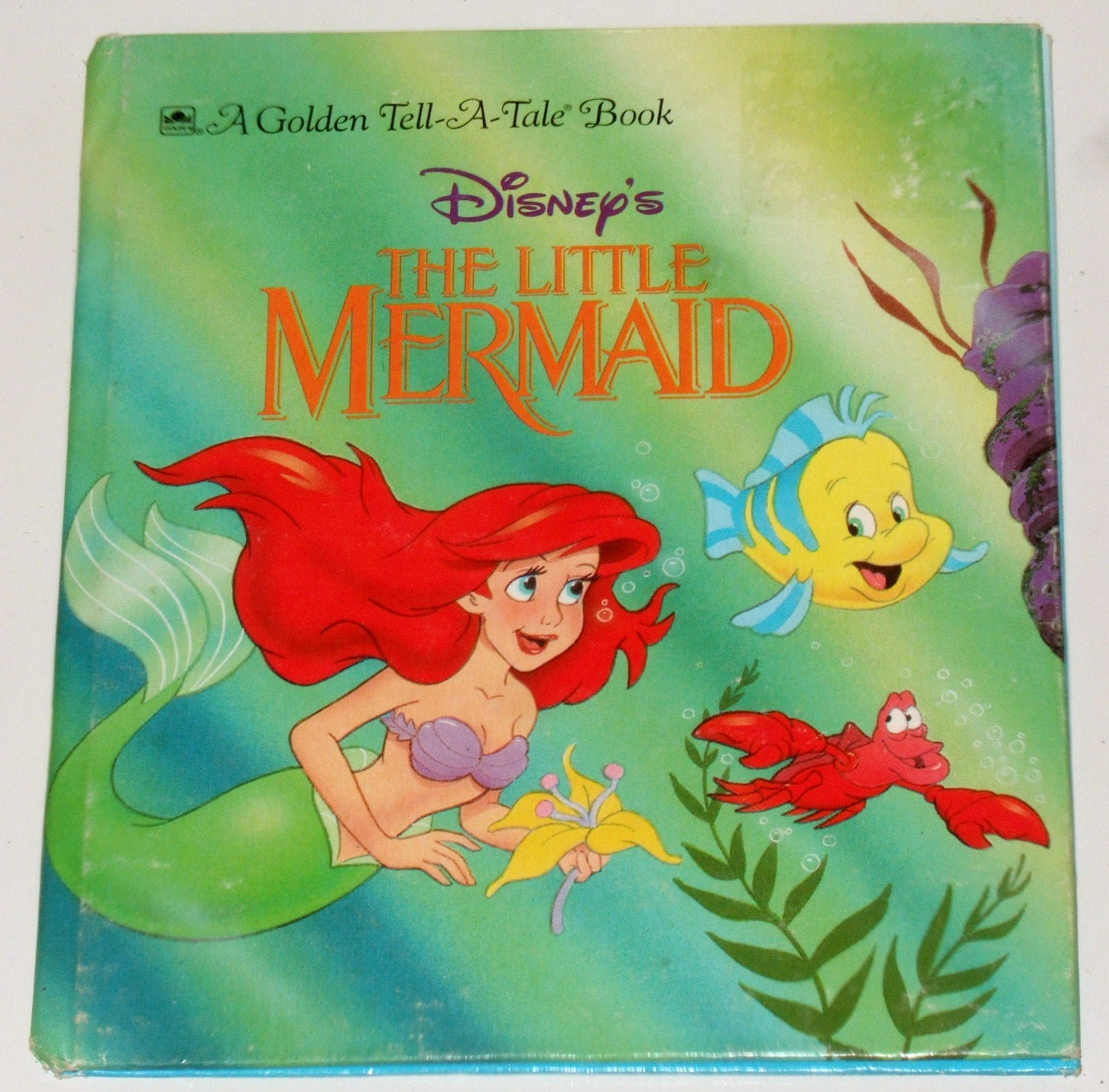 Disney's The little mermaid (A golden tell-a-tale book) Books