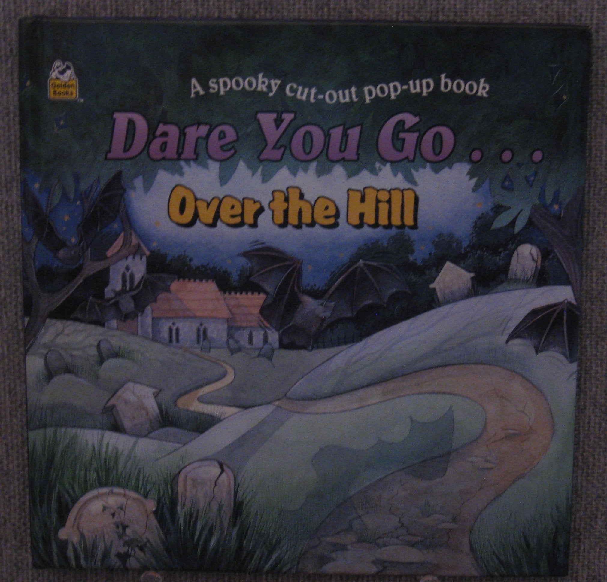 Dare You Go...over the Hill: A Spookey Cut-Out Pop-Up Book (A Golden Book) Books