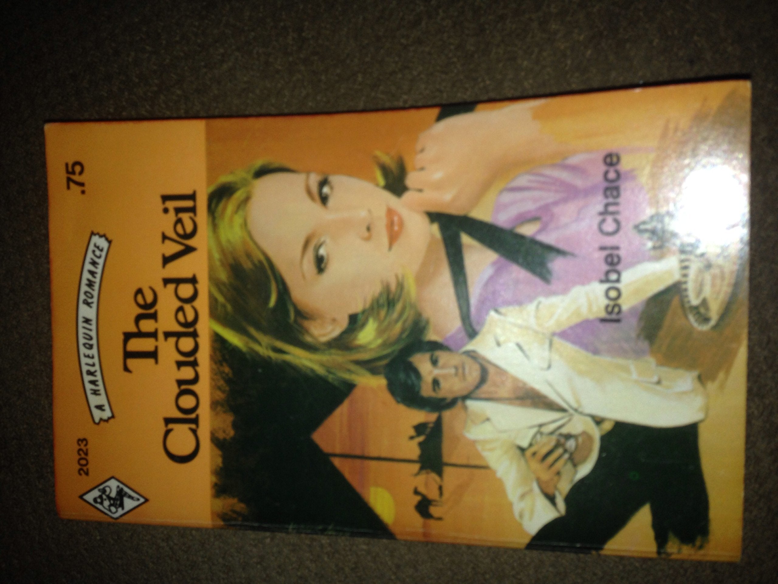 The Clouded Veil (Harlequin Romance, #2023) Books