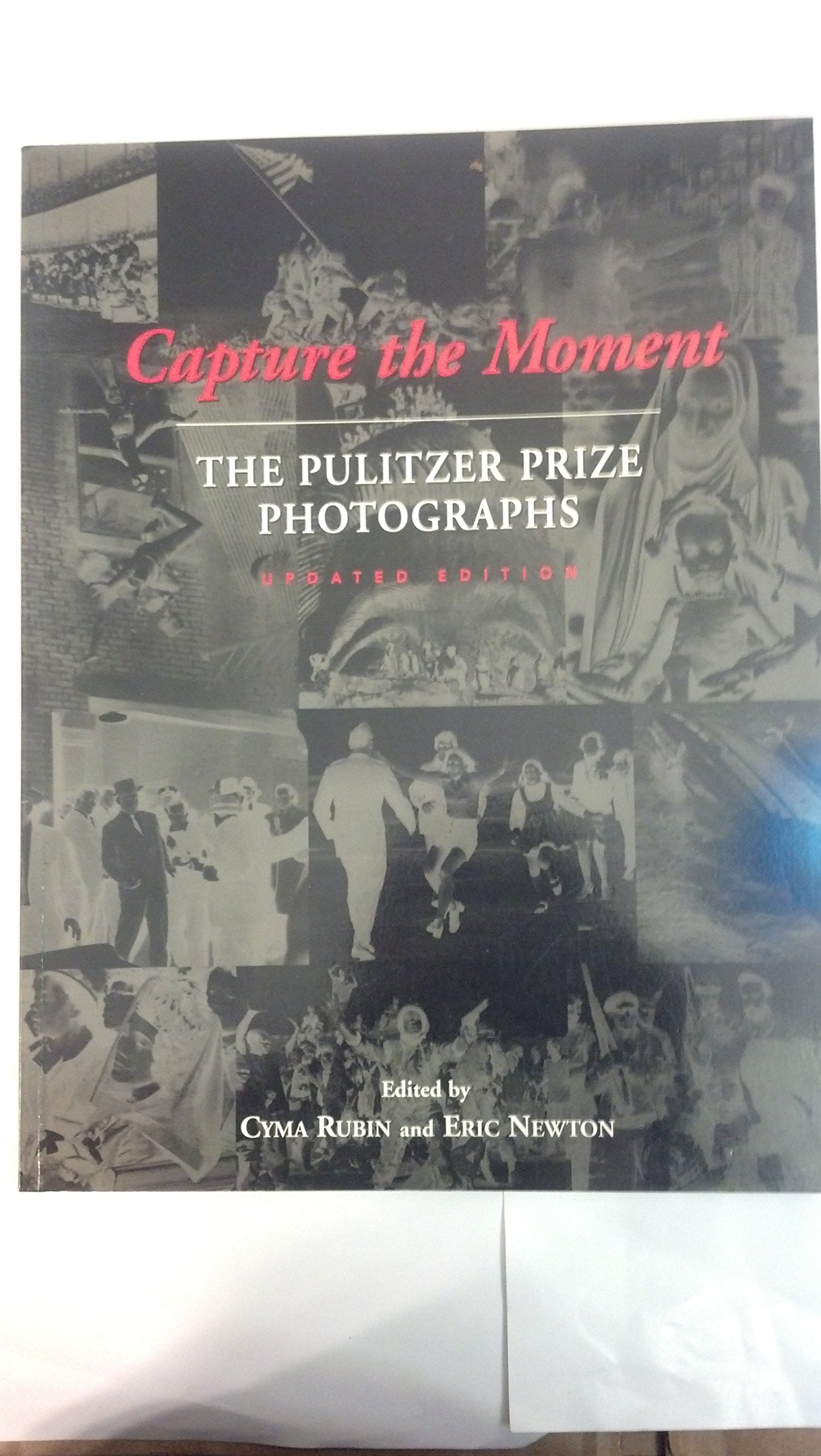 Capture the Moment: The Pulitzer Prize Photographs Travel