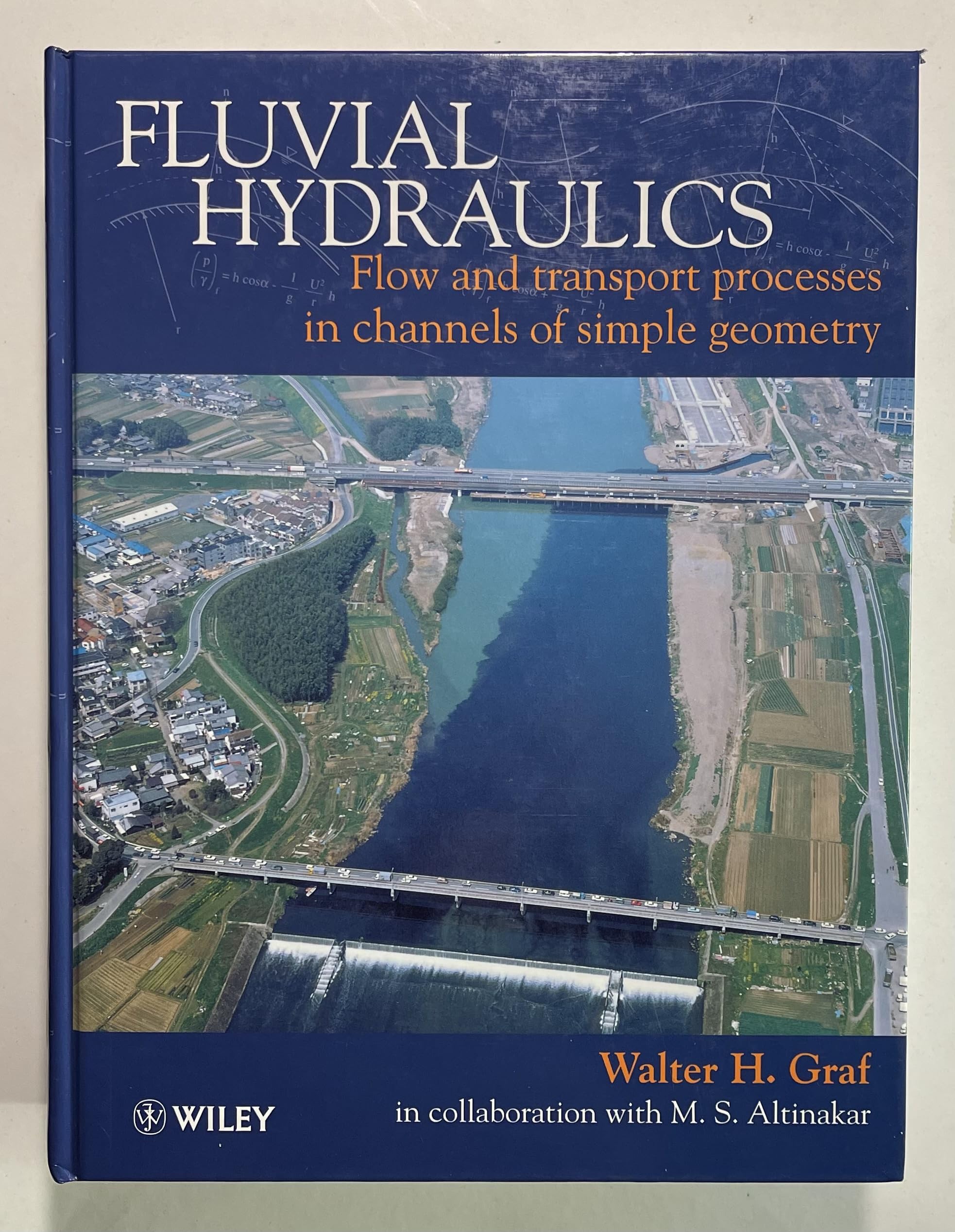 Fluvial Hydraulics: Flow and Transport Processes in Channels of Simple Geometry book