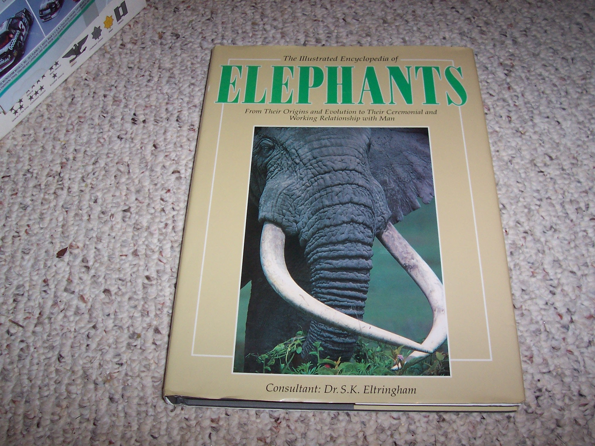 The Illustrated Encyclopedia of Elephants: From Their Origins and Evolution to Their Ceremonial and Working Relationship With Man Business & Technology