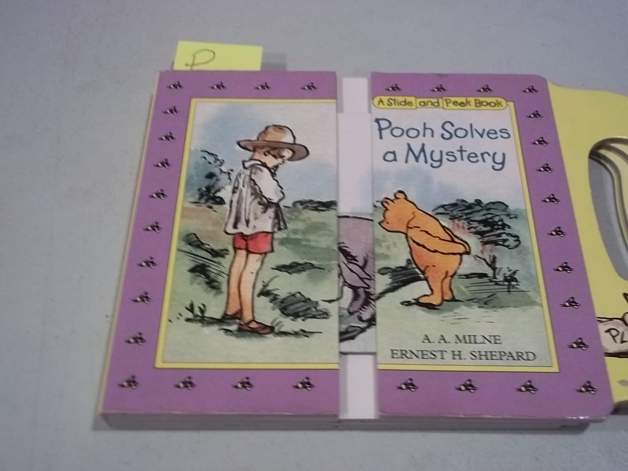 Pooh Solves a Mystery: A Slide and Peek Book (Slide-And-Peek Books) Novels & Short Stories