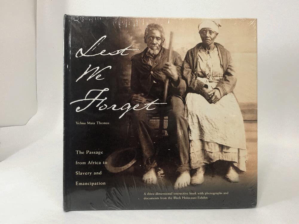 Lest We Forget: The Passage from Africa to Slavery and Emancipation : A Three-Dimensinal Interactive Book With Photographs and Documents from the Black Holocaust exhi Politics & History