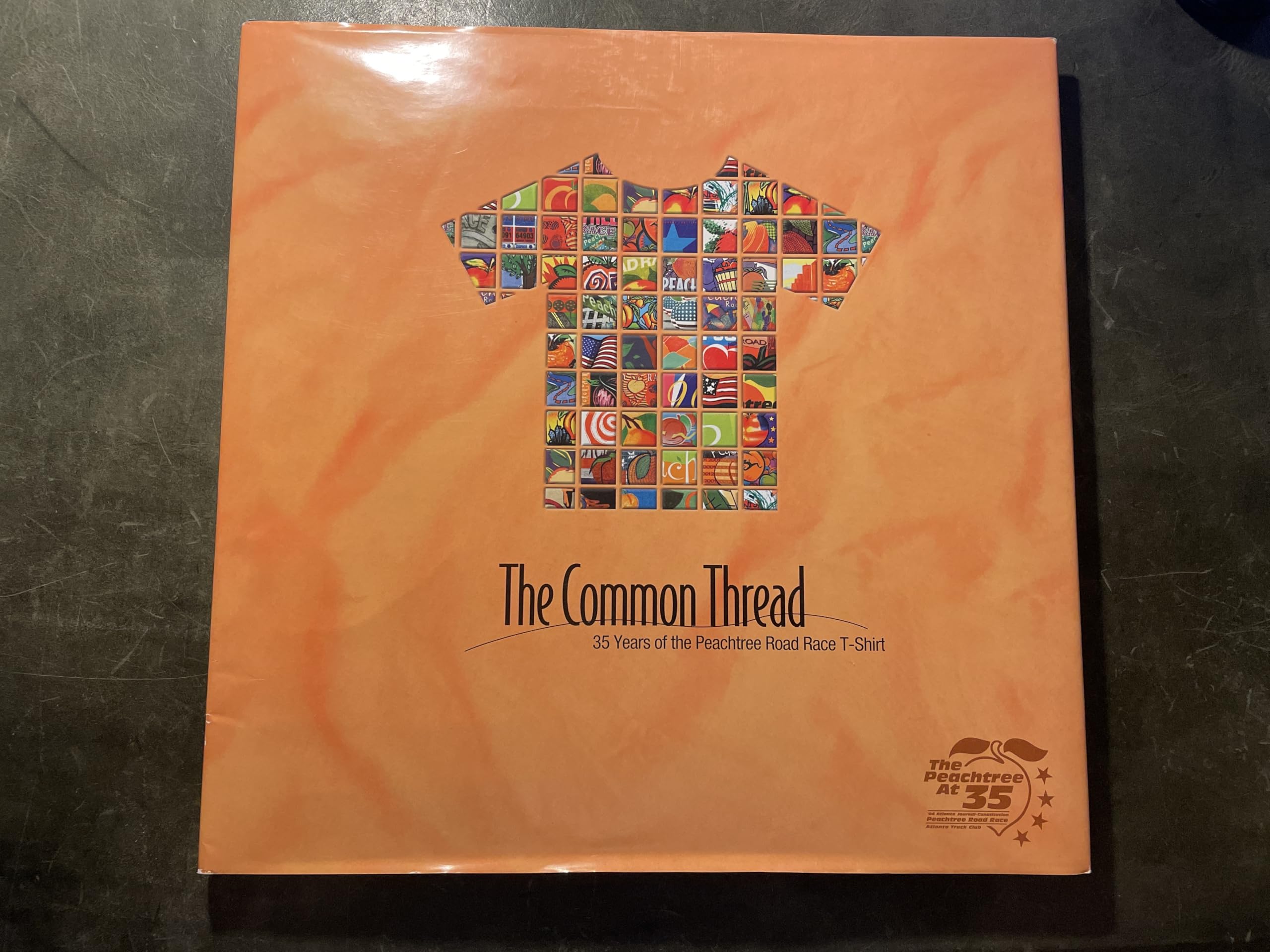 The Common Thread: 35 Years of the Peachtree Road Race T-Shirt Books