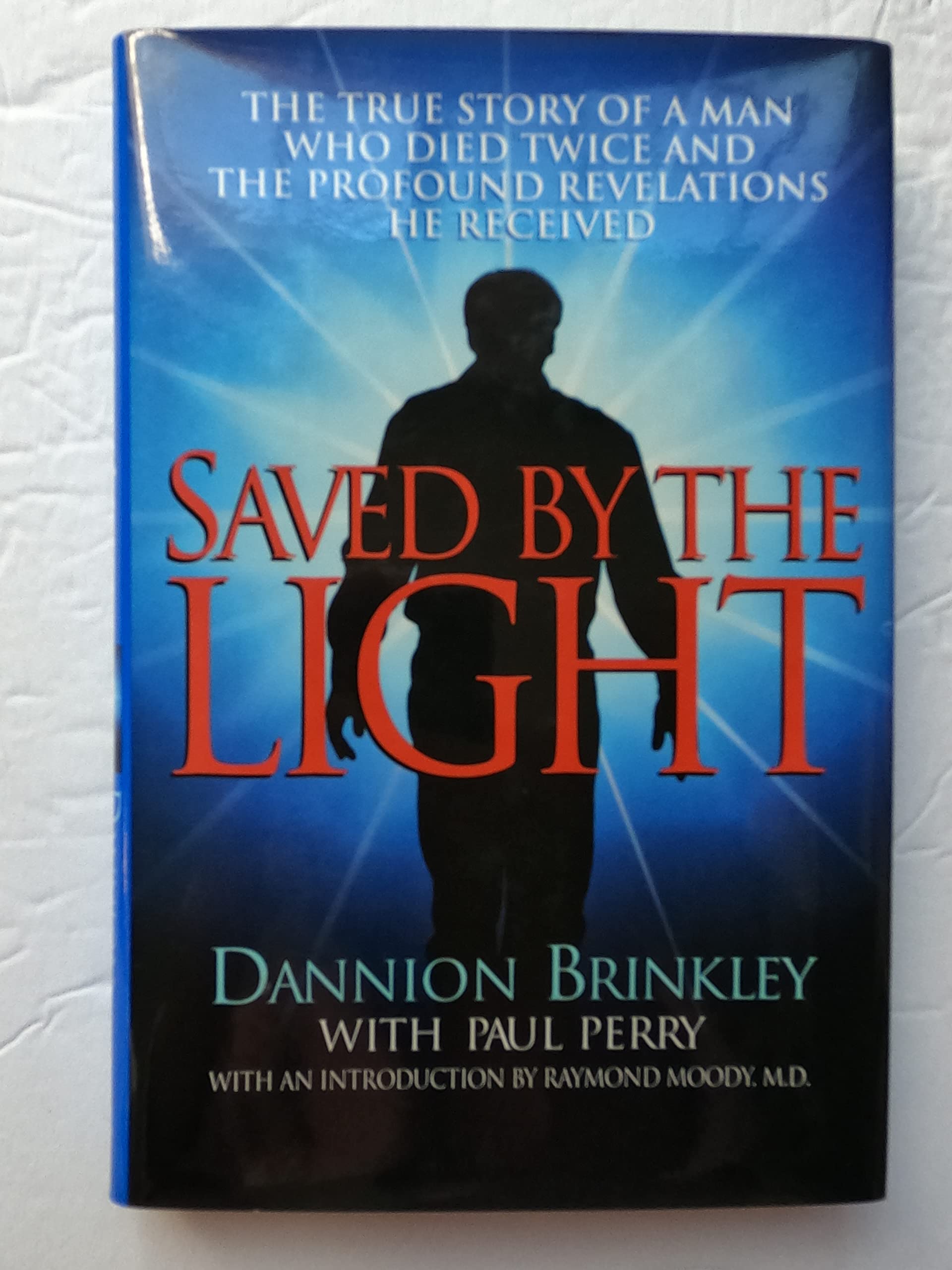 Saved by the Light: The True Story of a Man Who Died Twice and the Profound Revelations He Received Memories