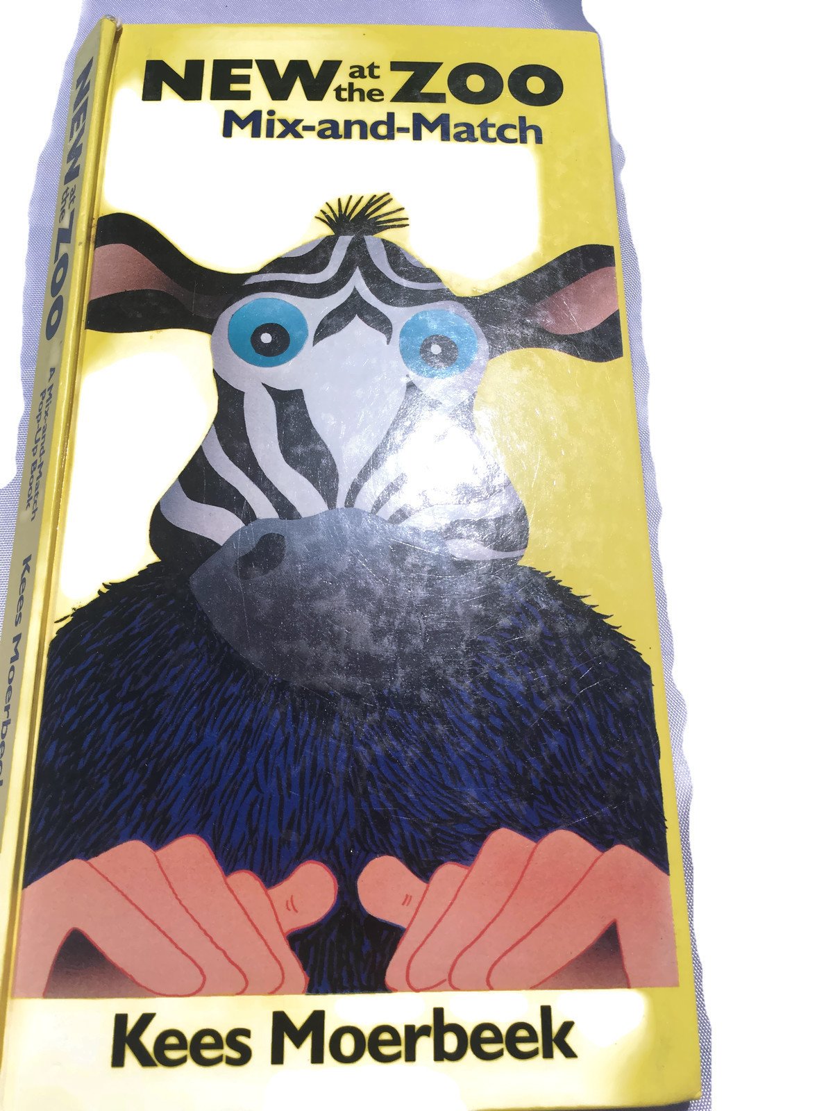 New at the Zoo (Mix-And-Match Pop-Up Book) Books