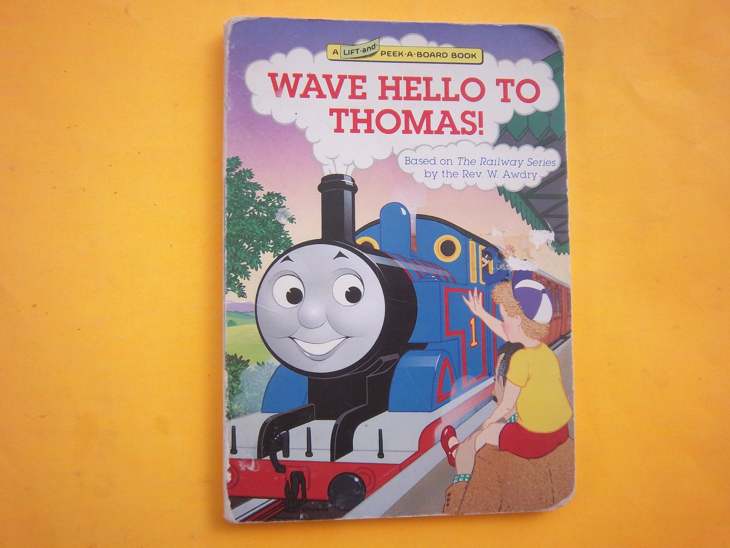 Wave Hello to Thomas!: Lift-and-peek-a-board Book Non-fiction