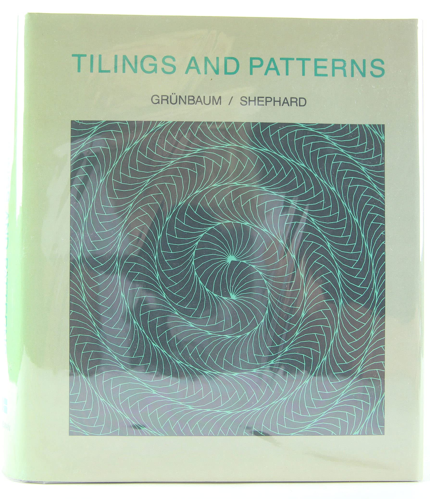 GRUENBAUM:TILINGS + PATT. GRÜNBAUM/SHEPHARD, TILINGS AND PATTERNS: An Introduction Law