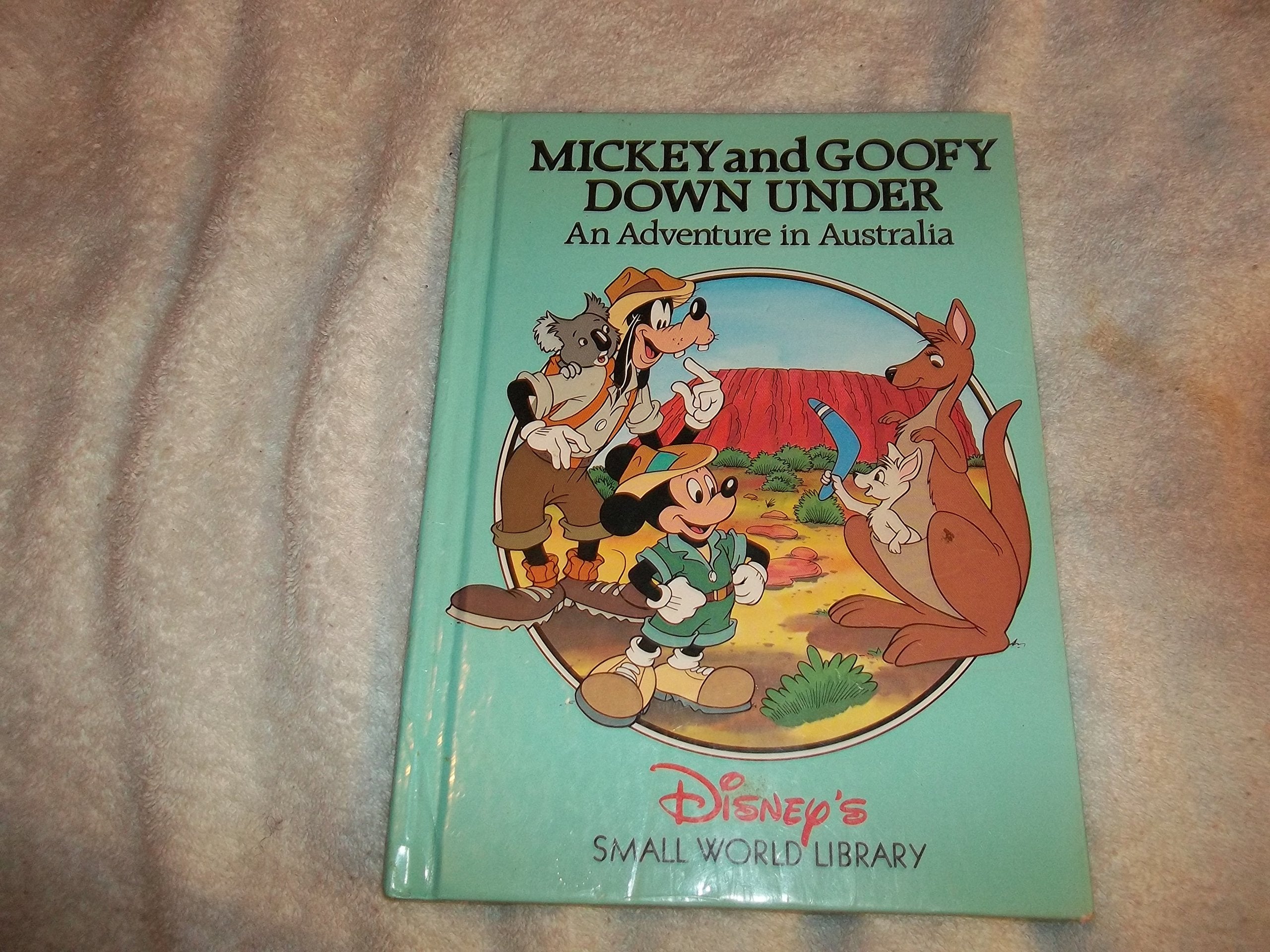 Mickey and Goofy Down Under: An Adventure in Australia (Disney's Small World Library) Books