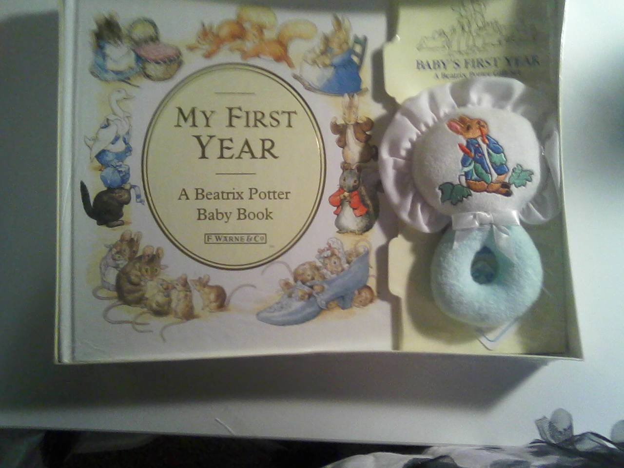 Baby's First Year: A Beatrix Potter Gift Set/Book and Rattle book