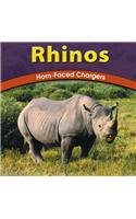 Rhinos: Horn-Faced Chargers (Wild World of Animals) Non-fiction