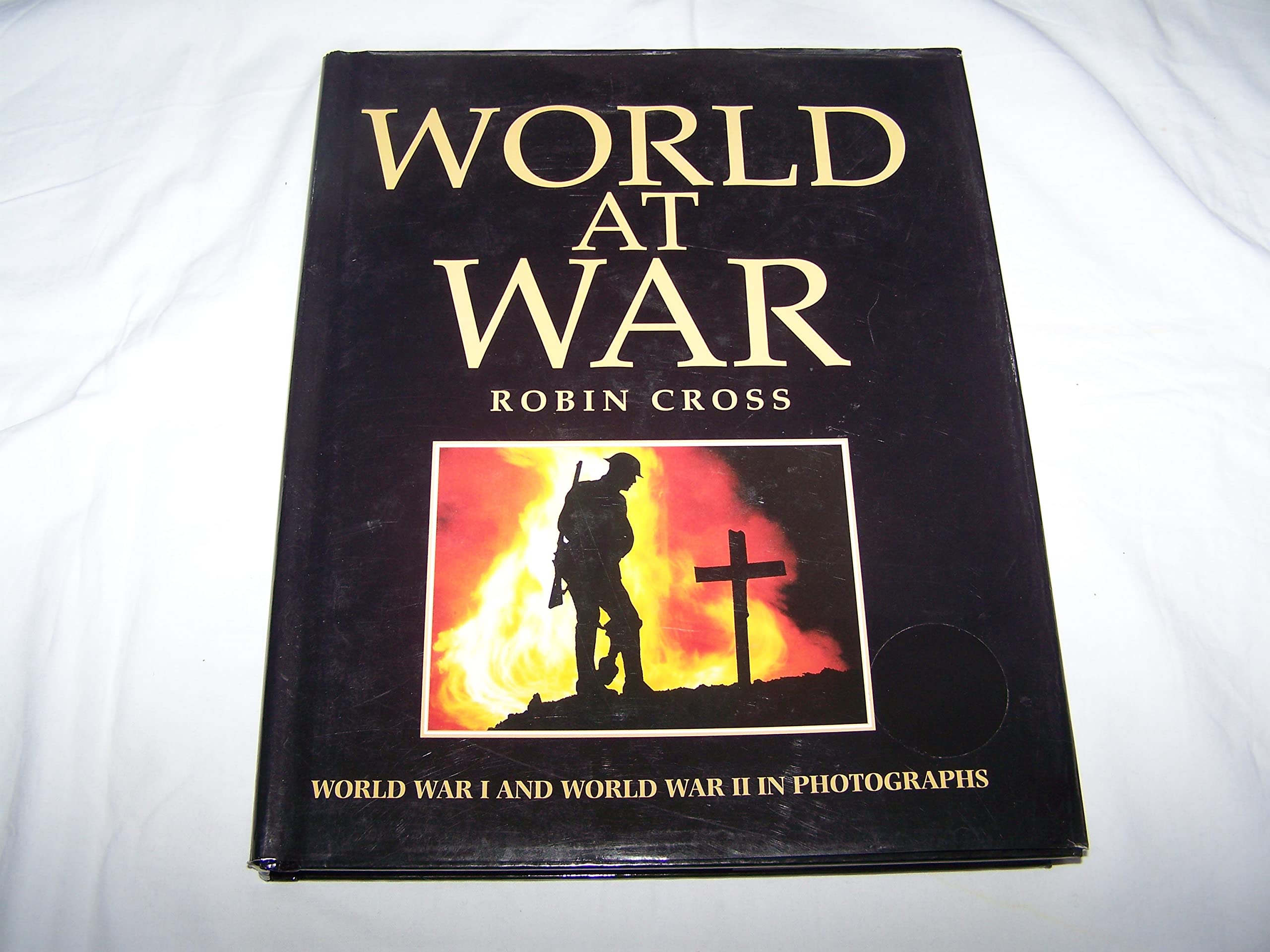 WORLD AT WAR. WORLD WAR I AND WORLD WAR II IN PHOTOGRAPHS. book