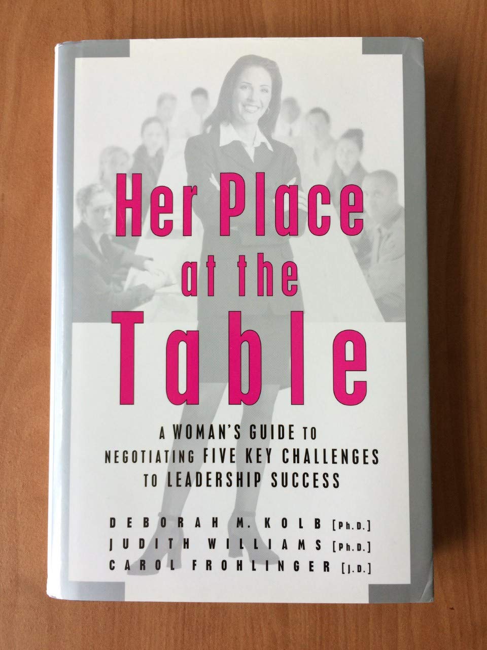 Her Place at the Table: A Woman's Guide to Negotiating Five Key Challenges to Leadership Success Business, Finance & Career