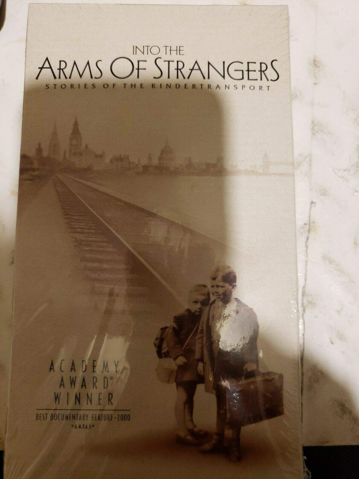 Into the Arms of Strangers-Sto Music