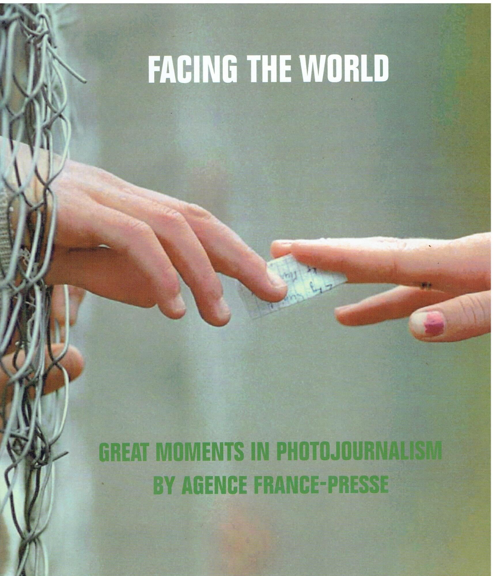 Facing the World: Great Moments in Photojournalism book