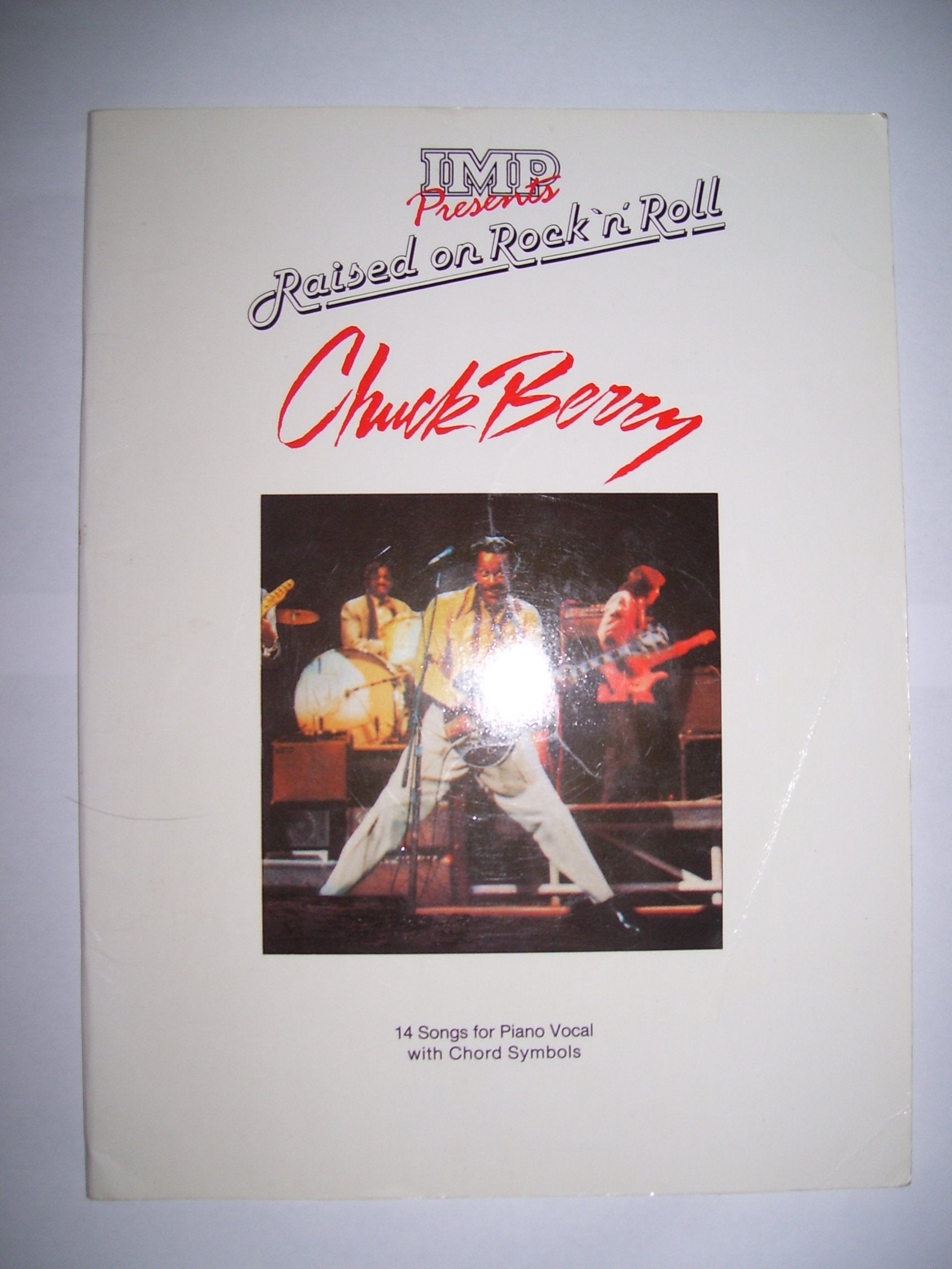 IMP presents raised on rock 'n' roll Chuck Berry: 14 songs for piano vocal with chord symbols Books