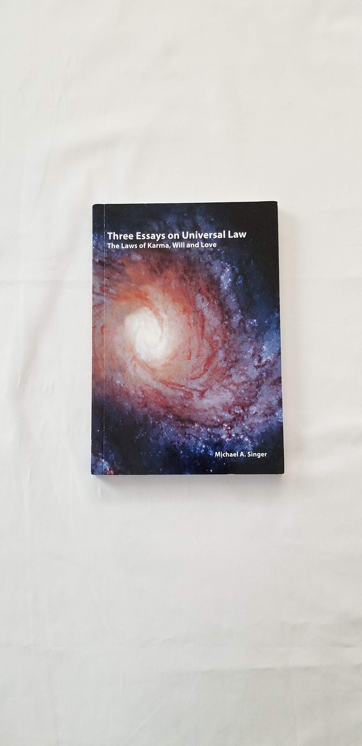 Three essays on universal law: The laws of Karma, will, and love Philosophy