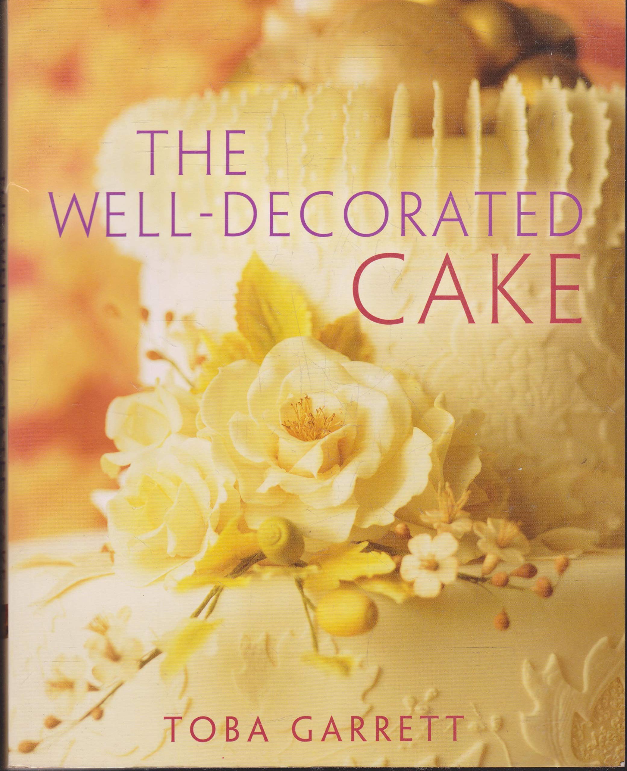 Garrett, T: WELL-DECORATED CAKE Leisure, Home & Garden