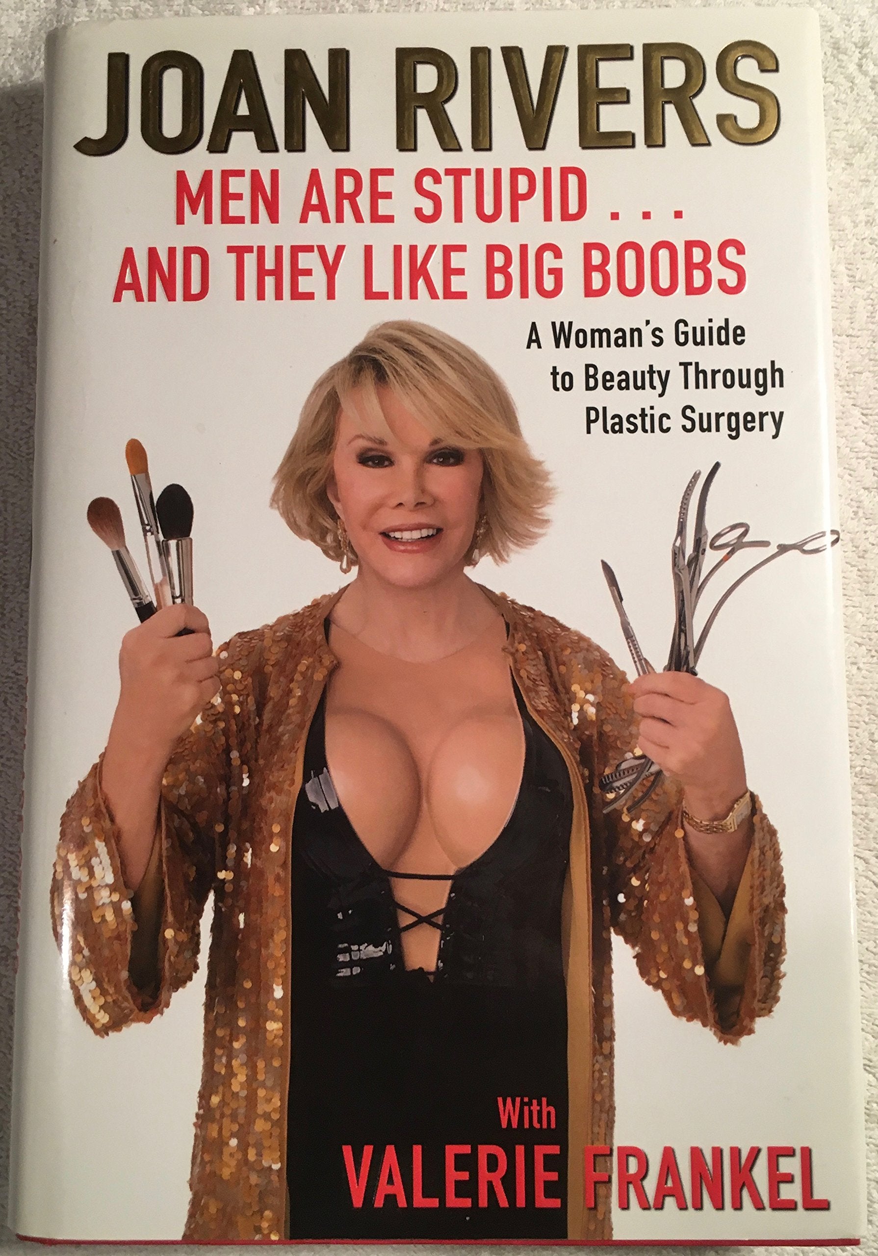 Men Are Stupid . . . And They Like Big Boobs: A Woman's Guide to Beauty Through Plastic Surgery Art & Literature