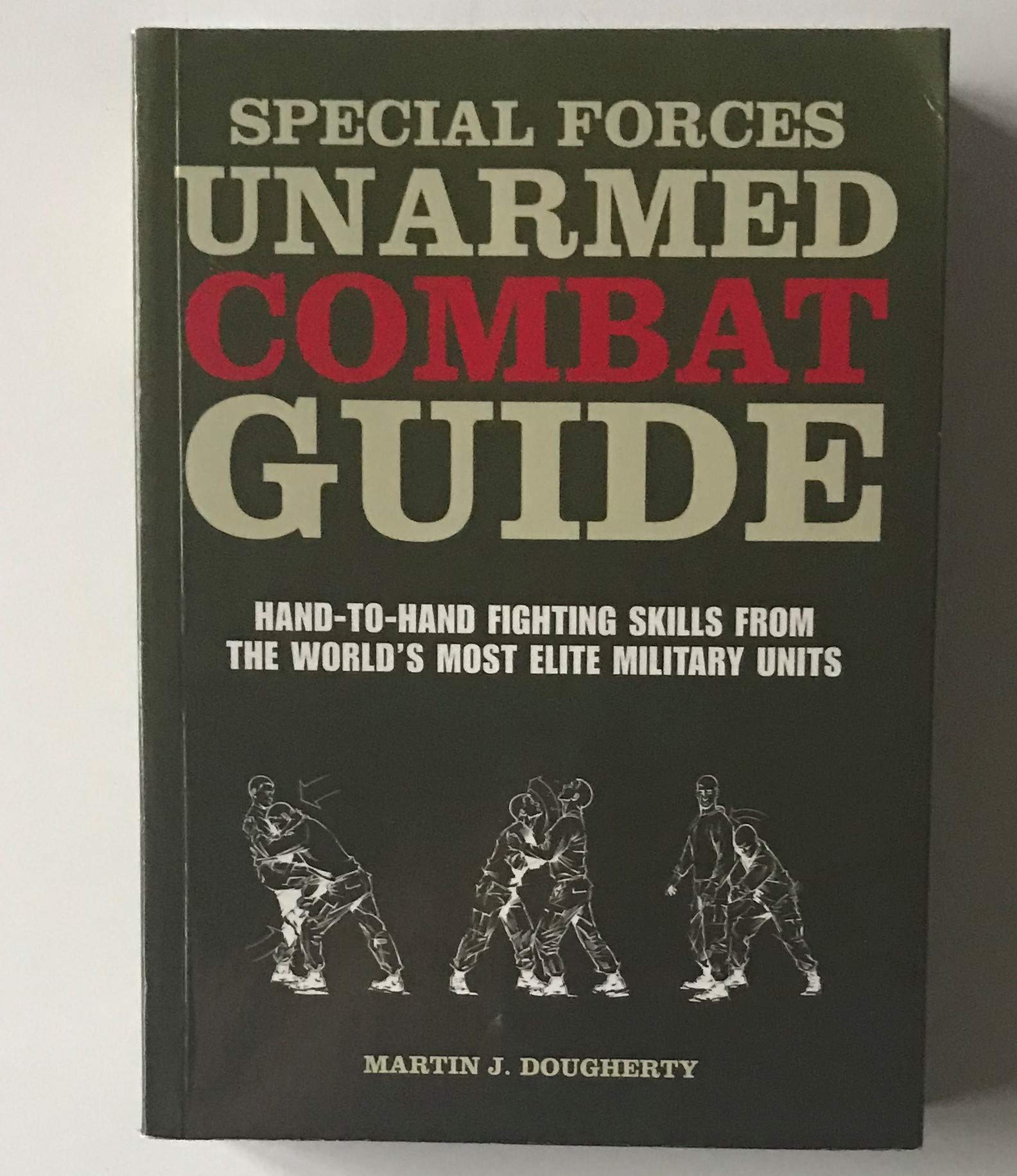 UNARMED COMBAT HAND-TO-HAND FIGHTING SKILLS FROM THE WORLD'S MOST ELITE MILITARY UNITS BY (DOUGHERTY, MARTIN J.) PAPERBACK book