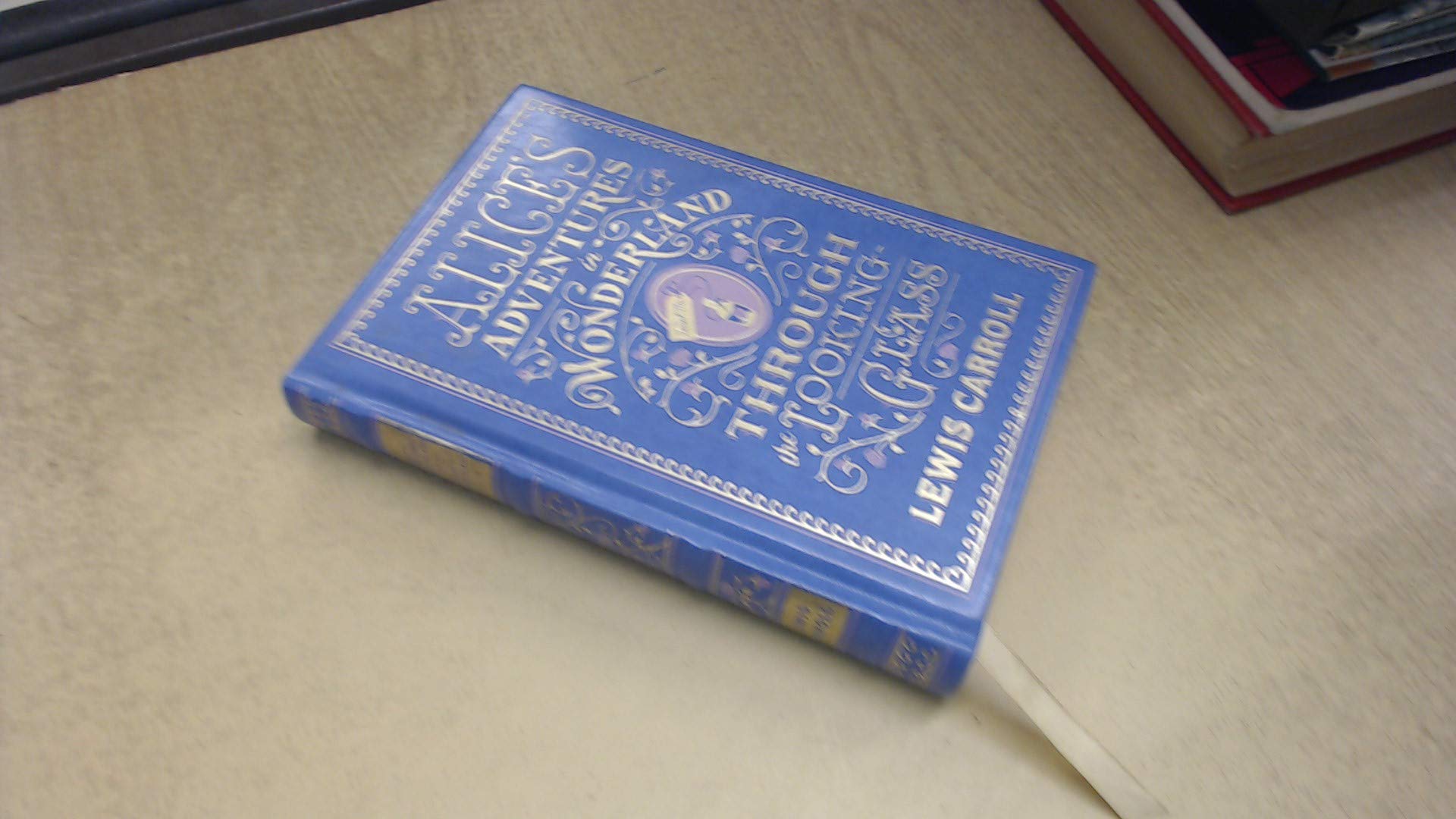 Alice's Adventures in Wonderland and Through the Looking-Glass book