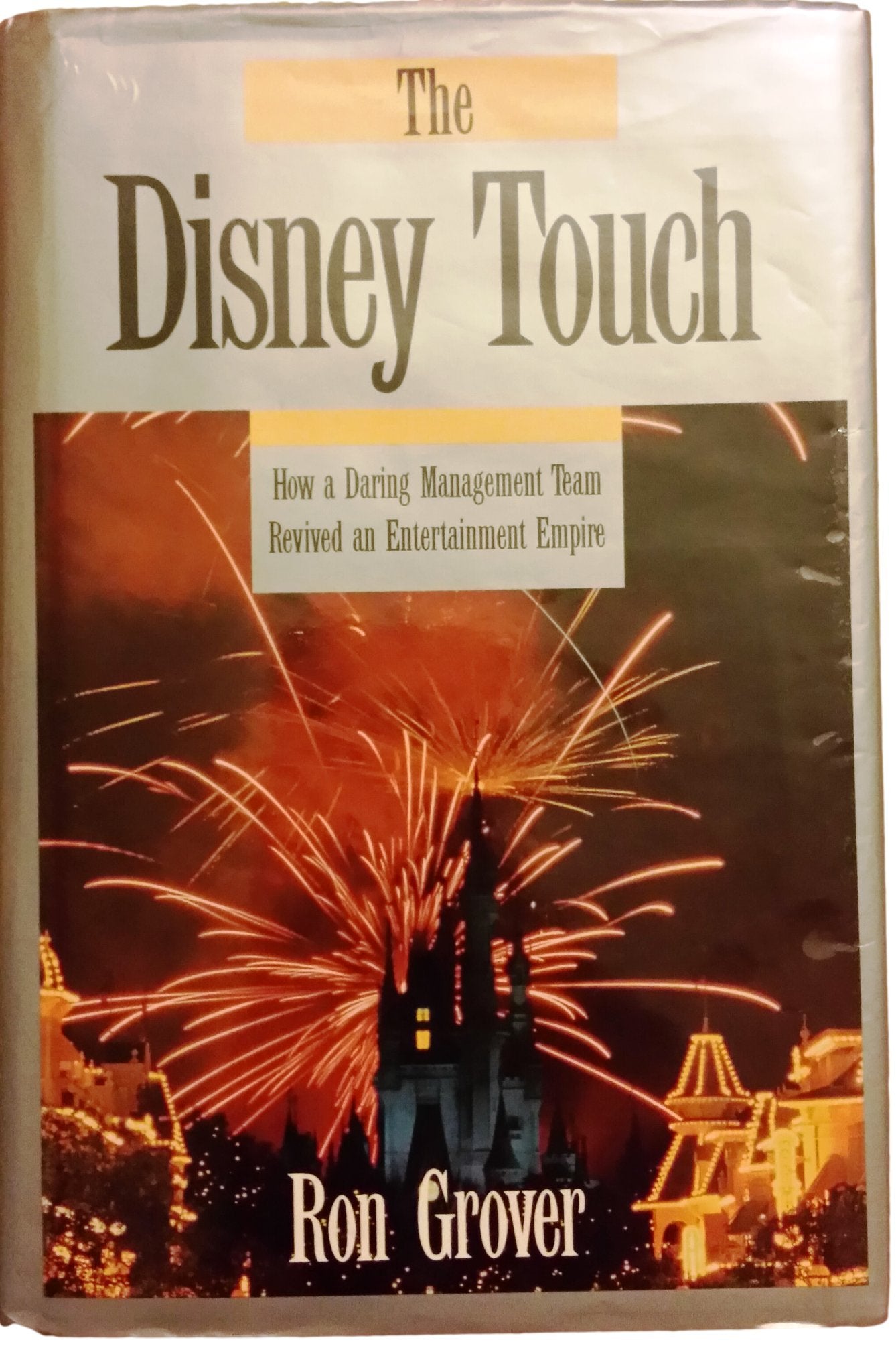 The Disney Touch: How a Daring Management Team Revived an Entertainment Empire Business, Finance & Career