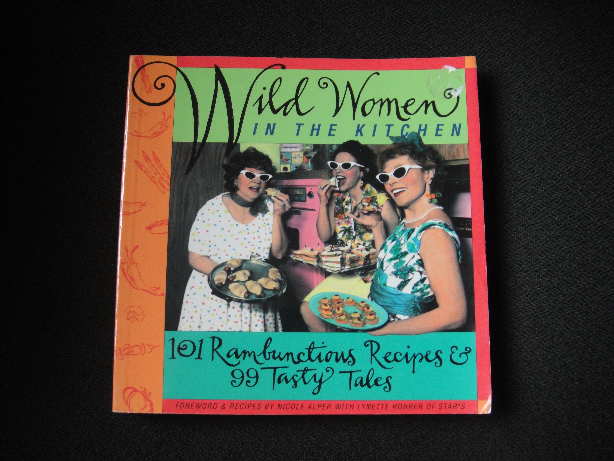 Wild Women in the Kitchen: 101 Rambunctious Recipes & 99 Tasty Tales book