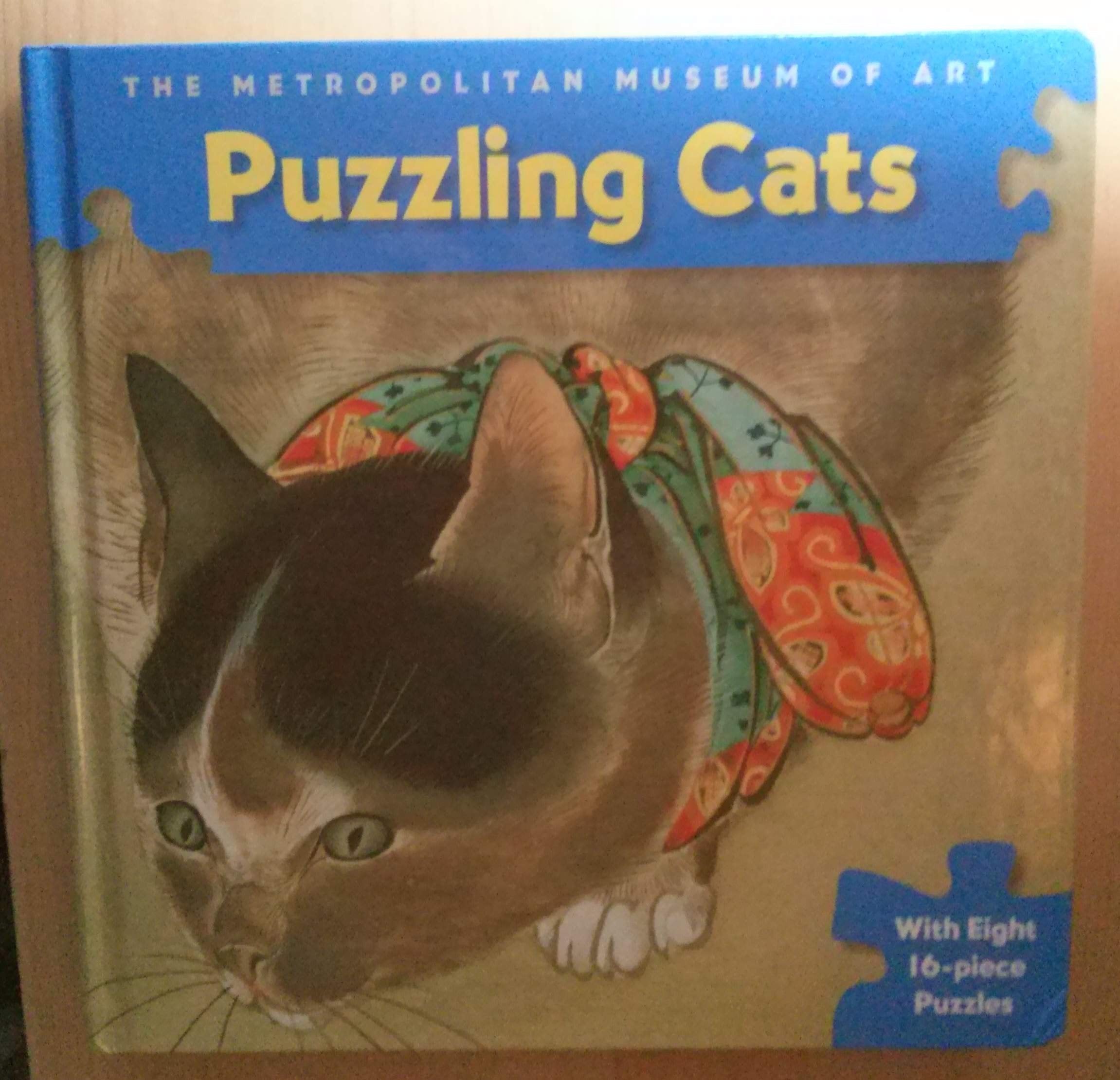 Puzzling Cats: With Eight 16-piece Puzzles Books