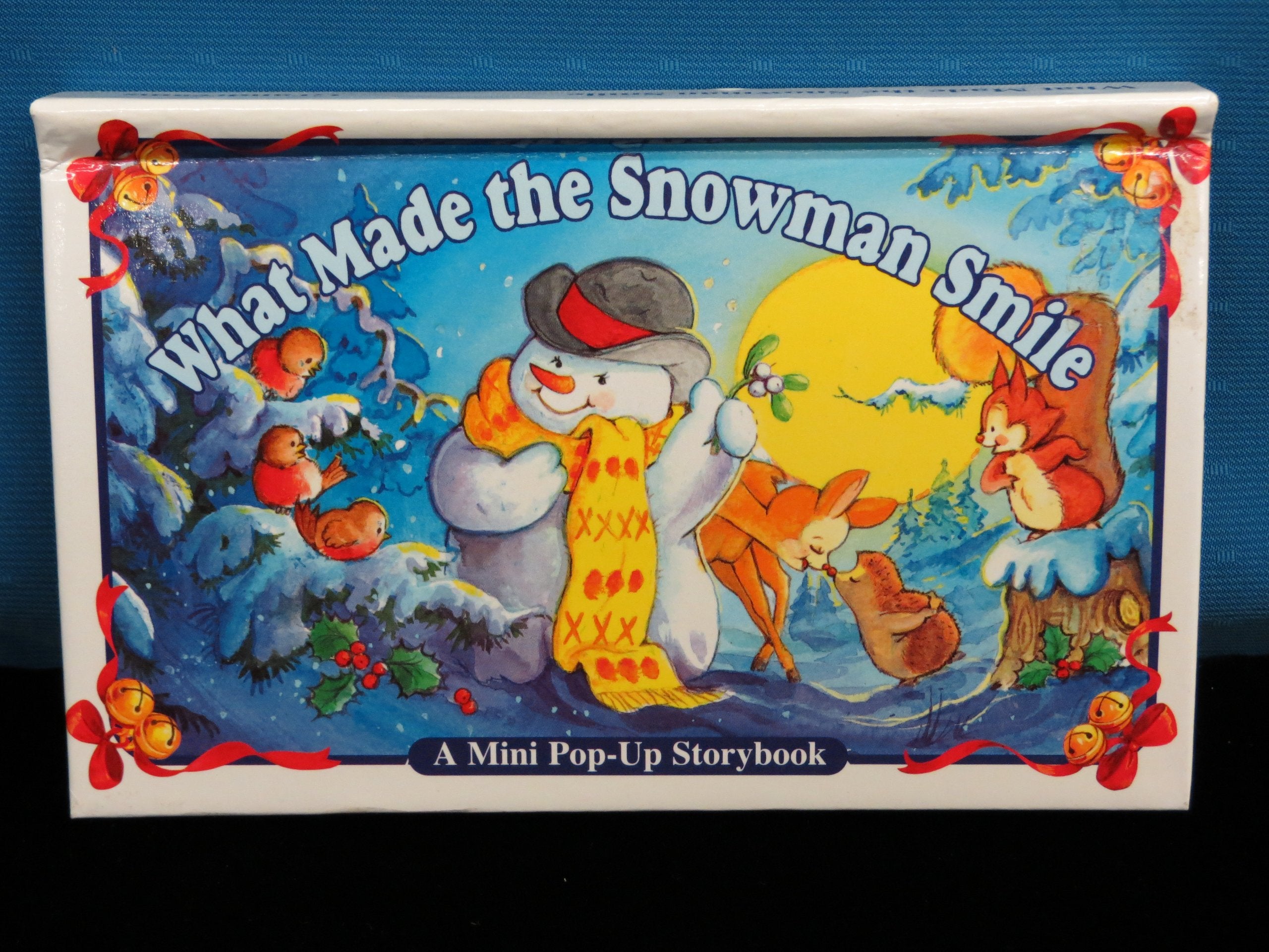 Magic Little Christmas Tree; What Made the Snowman Smile; Welcome to Santa's Toyshop; Santa's Sleigh Ride (Musical Christmas Pop-Up Books) Novels & Short Stories