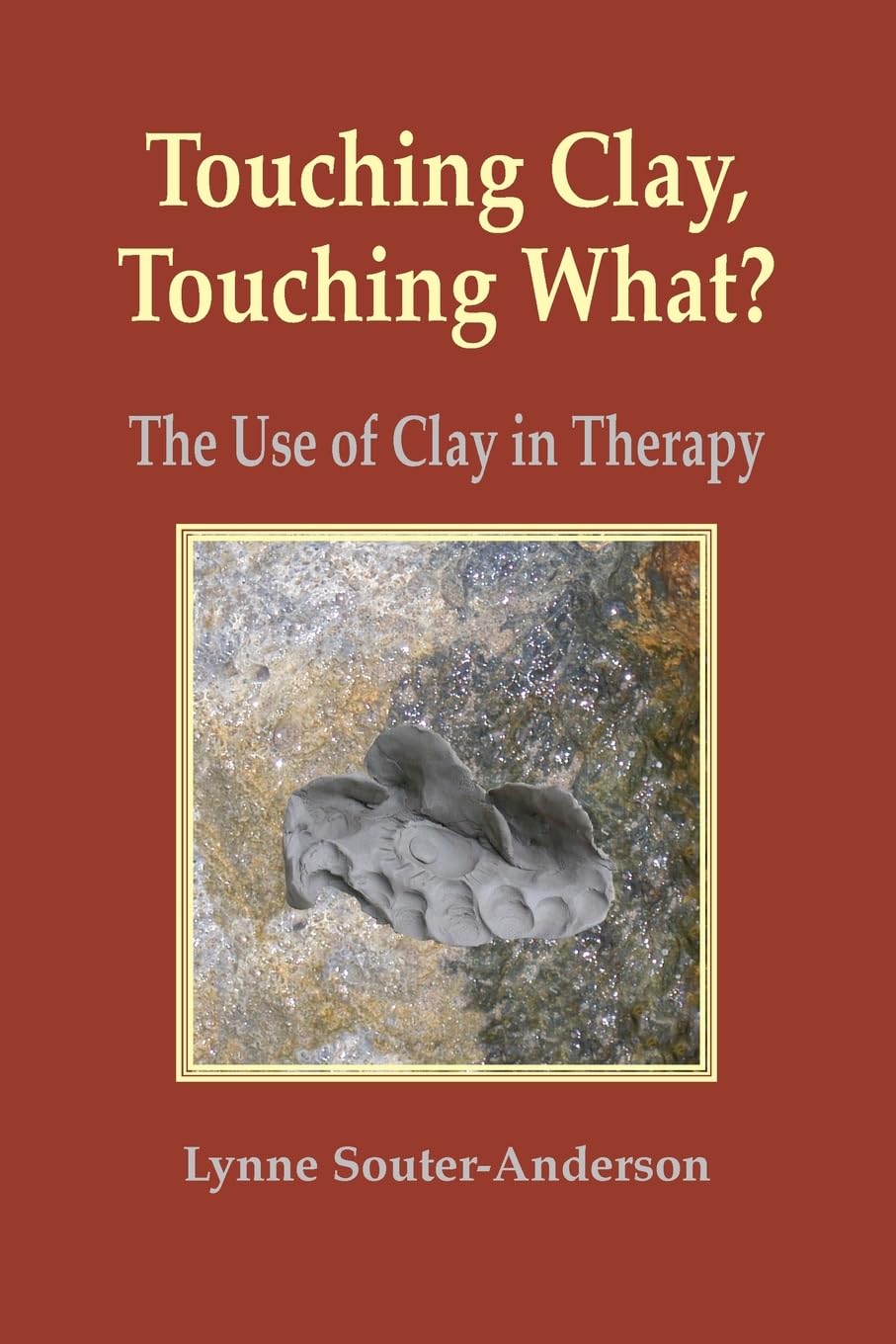 Touching Clay, Touching What?: The Use of Clay in Therapy book