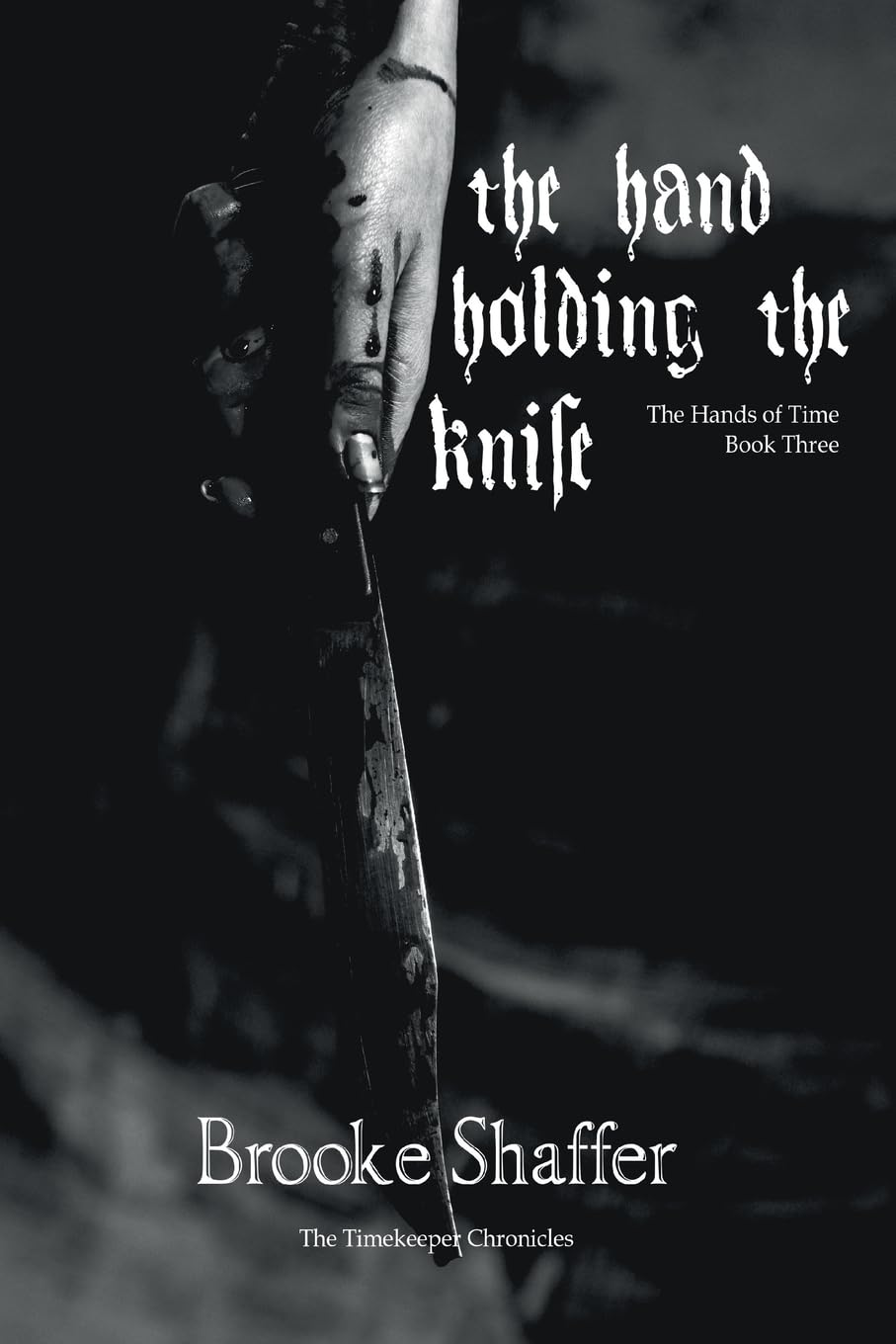 The Hand Holding the Knife Action & Adventure