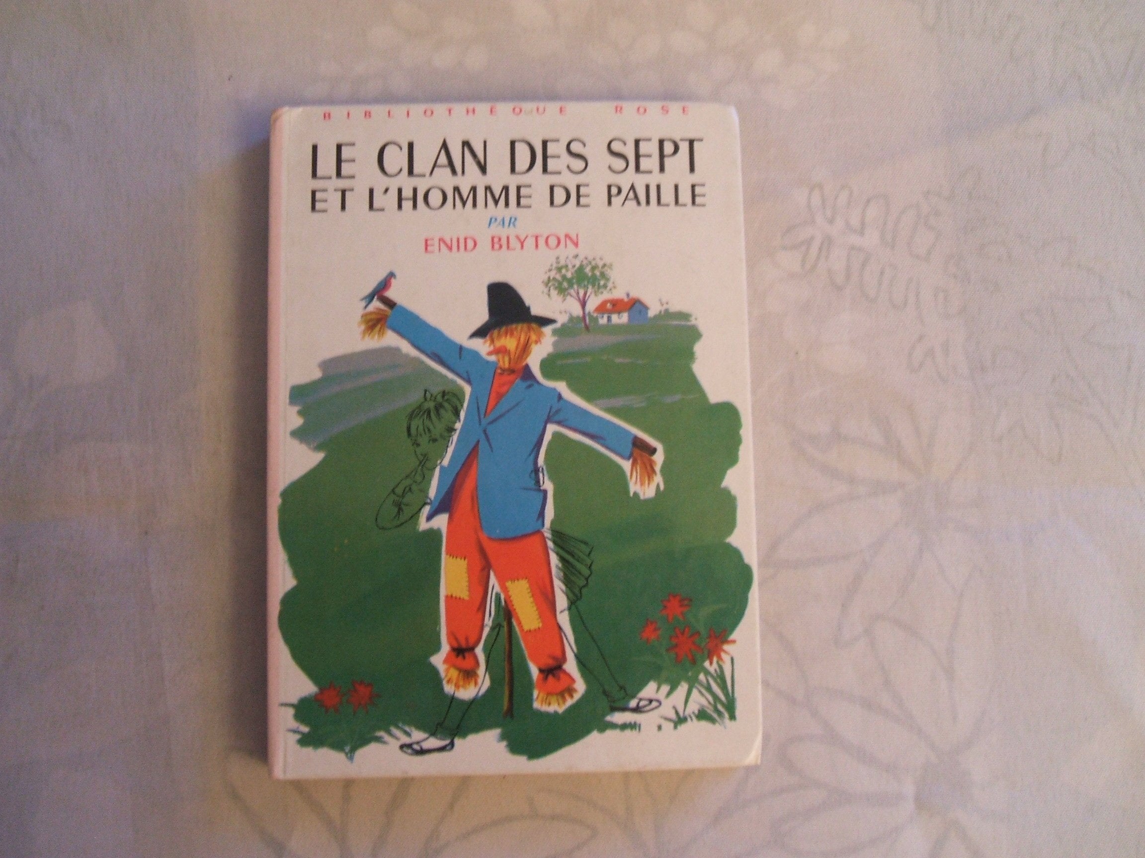 Le clan des sept et l'homme de paille book