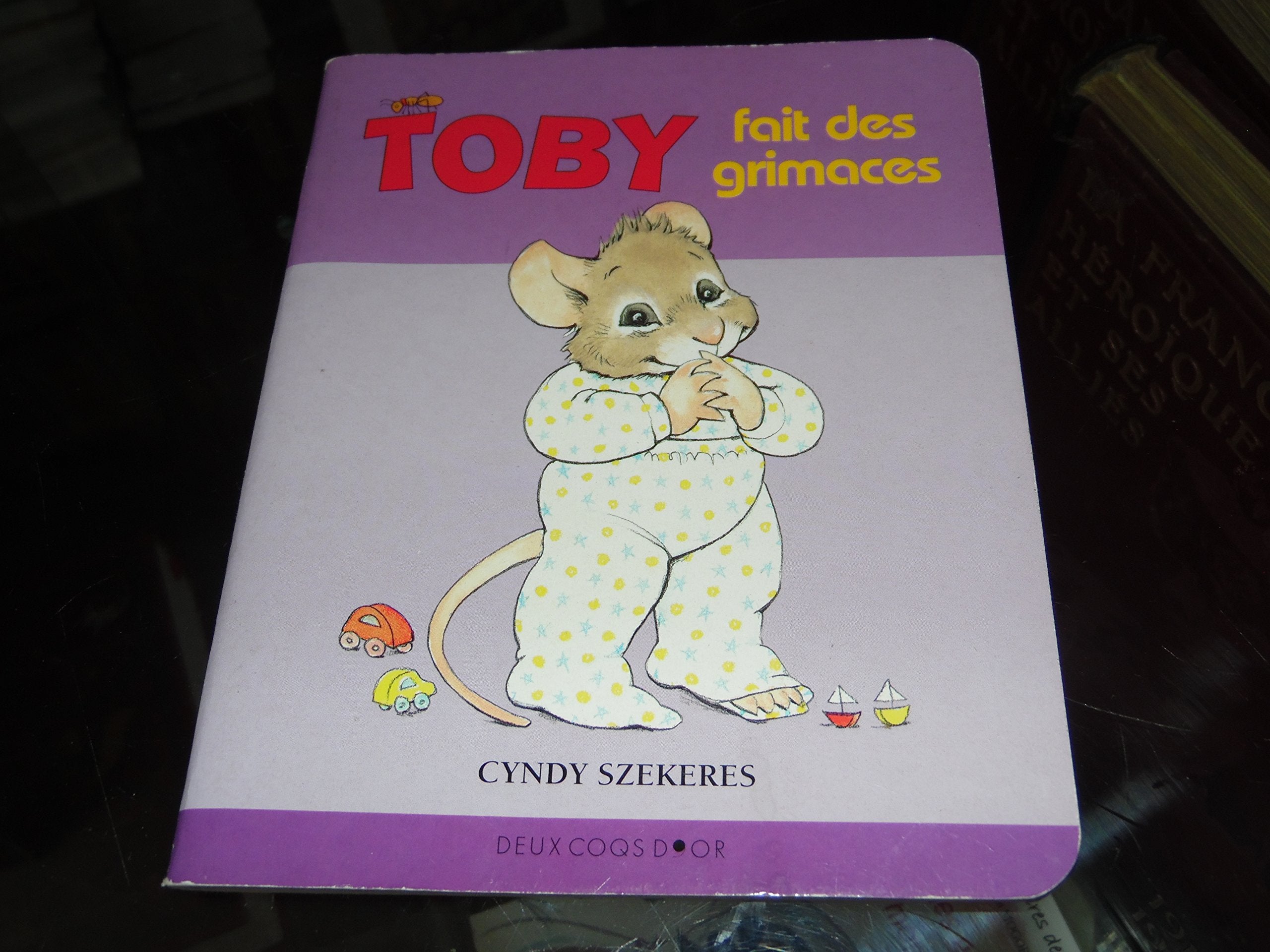 Toby fait des grimaces book