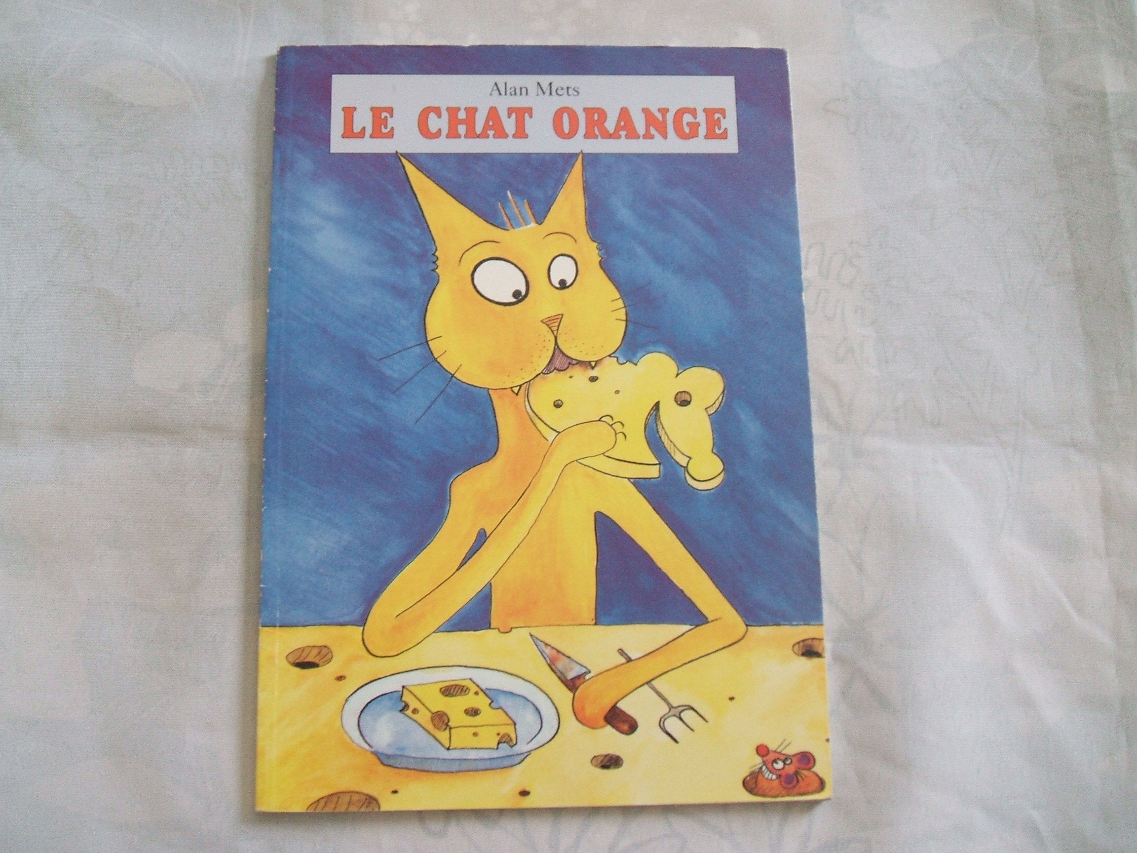 LE CHAT ORANGE Books