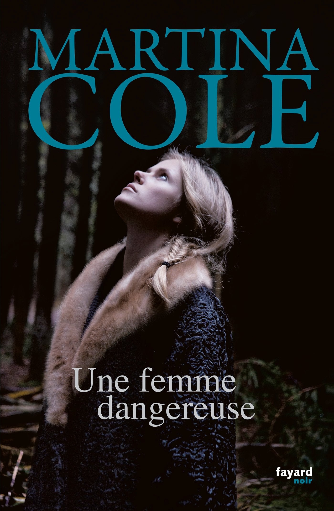 Une femme dangereuse: traduit de l'anglais par Stéphane Carn book