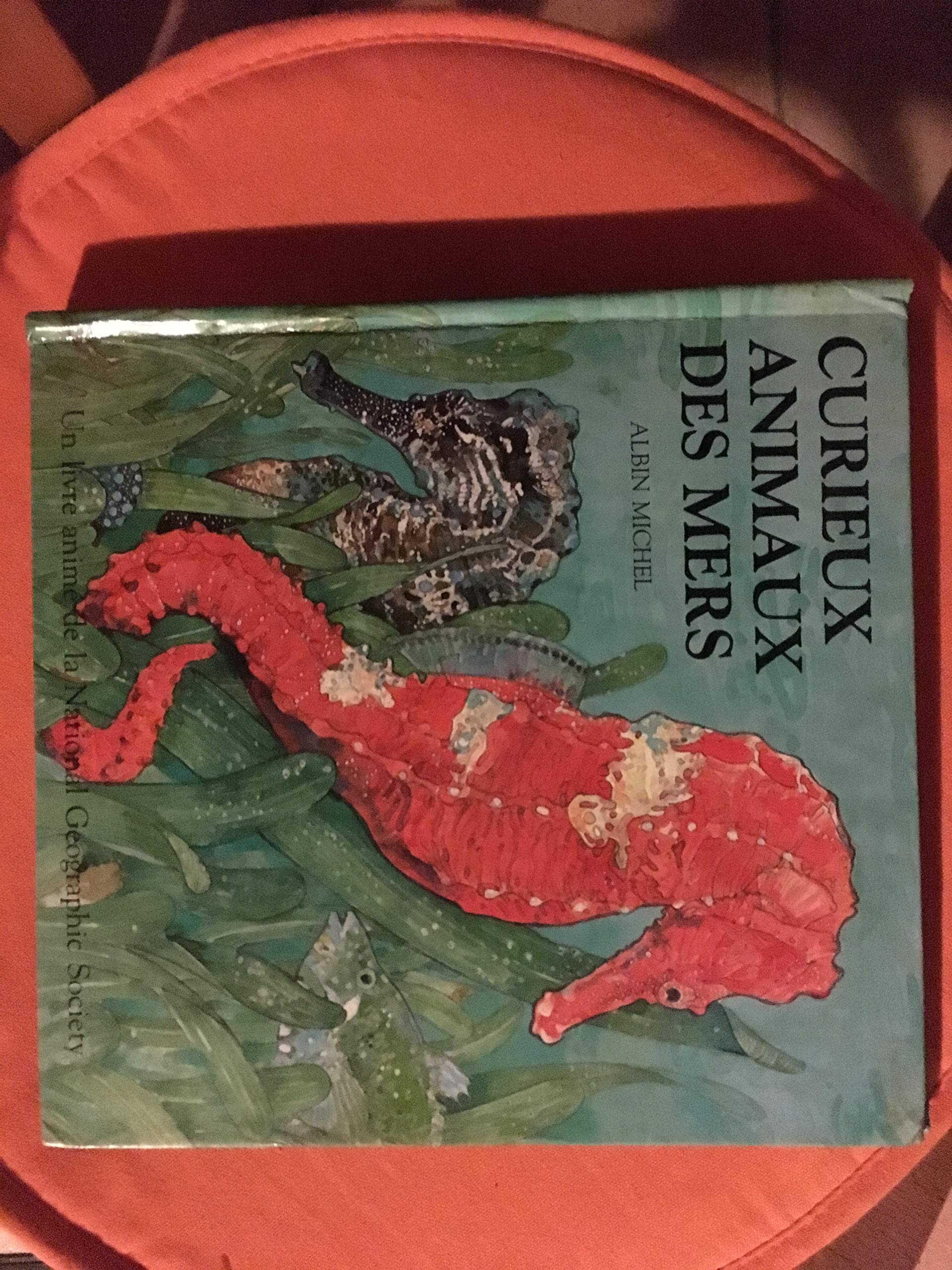 Curieux animaux des mers: Un livre animé book