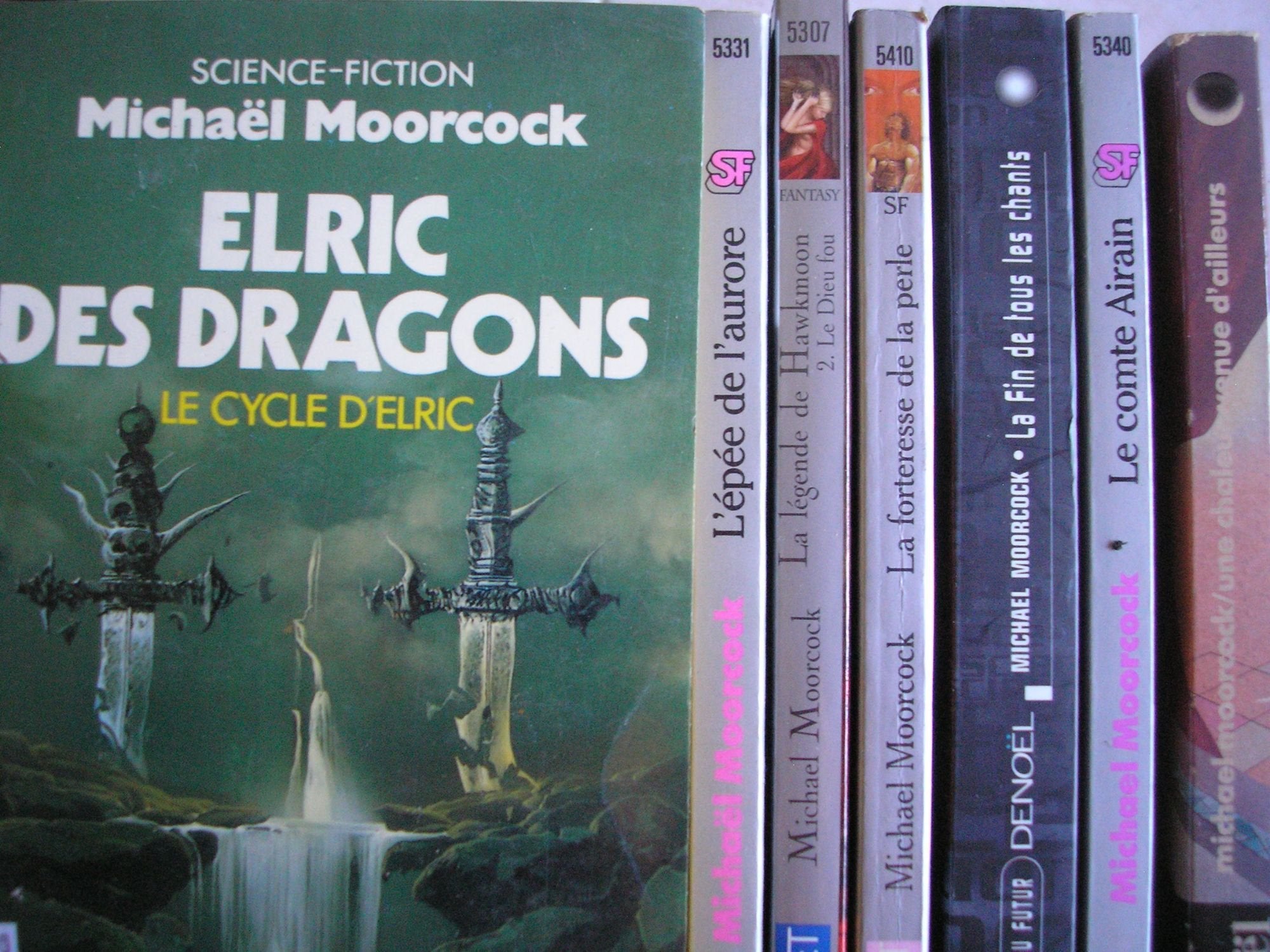 michael moorcock - lot 7 livres : le cycle d'elric la forteresse de la perle + elric des dragons - la fin de tous les chants - une chaleur venue d'ailleurs - la légende de hawkmoon T2 le dieu fou + l'épée de l'aurore - la nouvelle légende de hawkmoon l... book