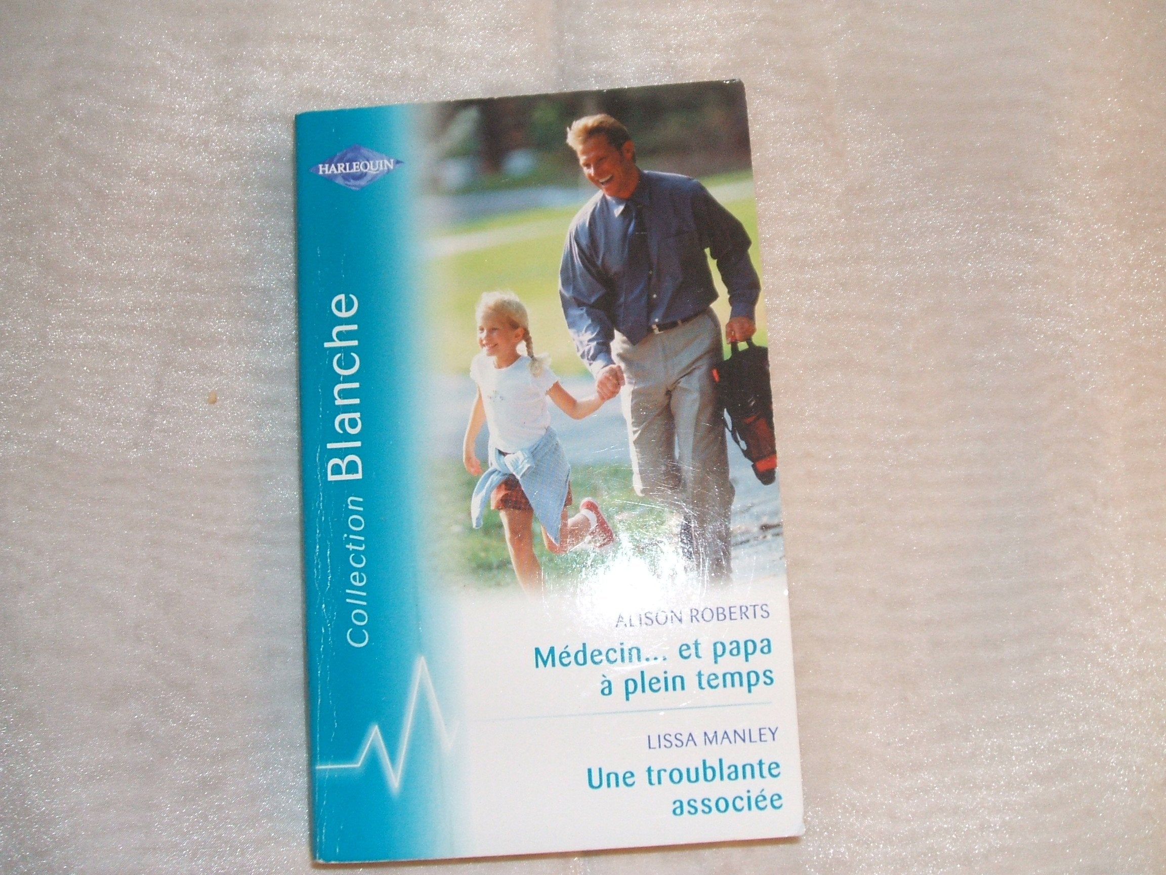 Médecin... et papa à plein temps - Une troublante associée book