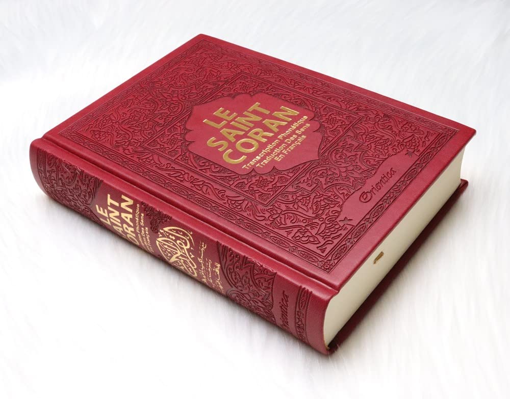 Le Saint Coran - Transcription phonétique et Traduction des sens en français - Edition de luxe (Couverture cuir de couleur Bordeaux doré) book