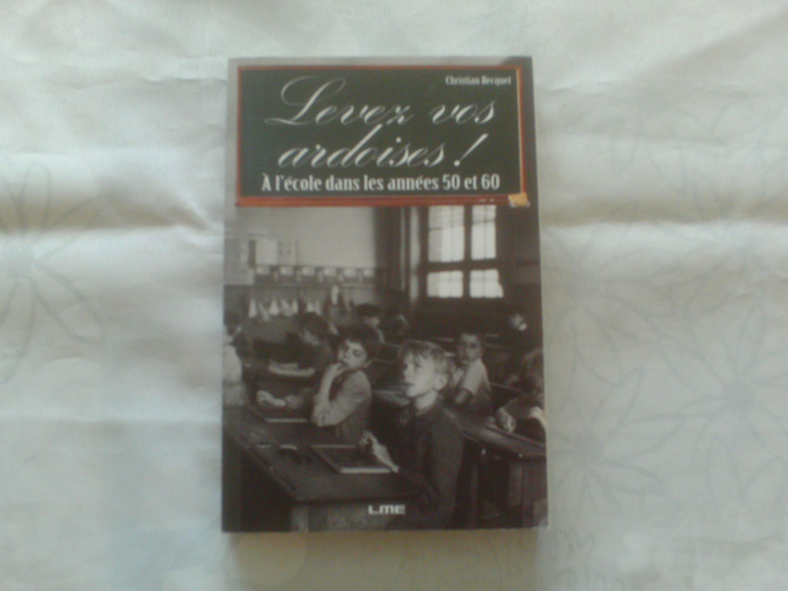 Levez vos ardoises ! : A l'école dans les années 50 et 60 book