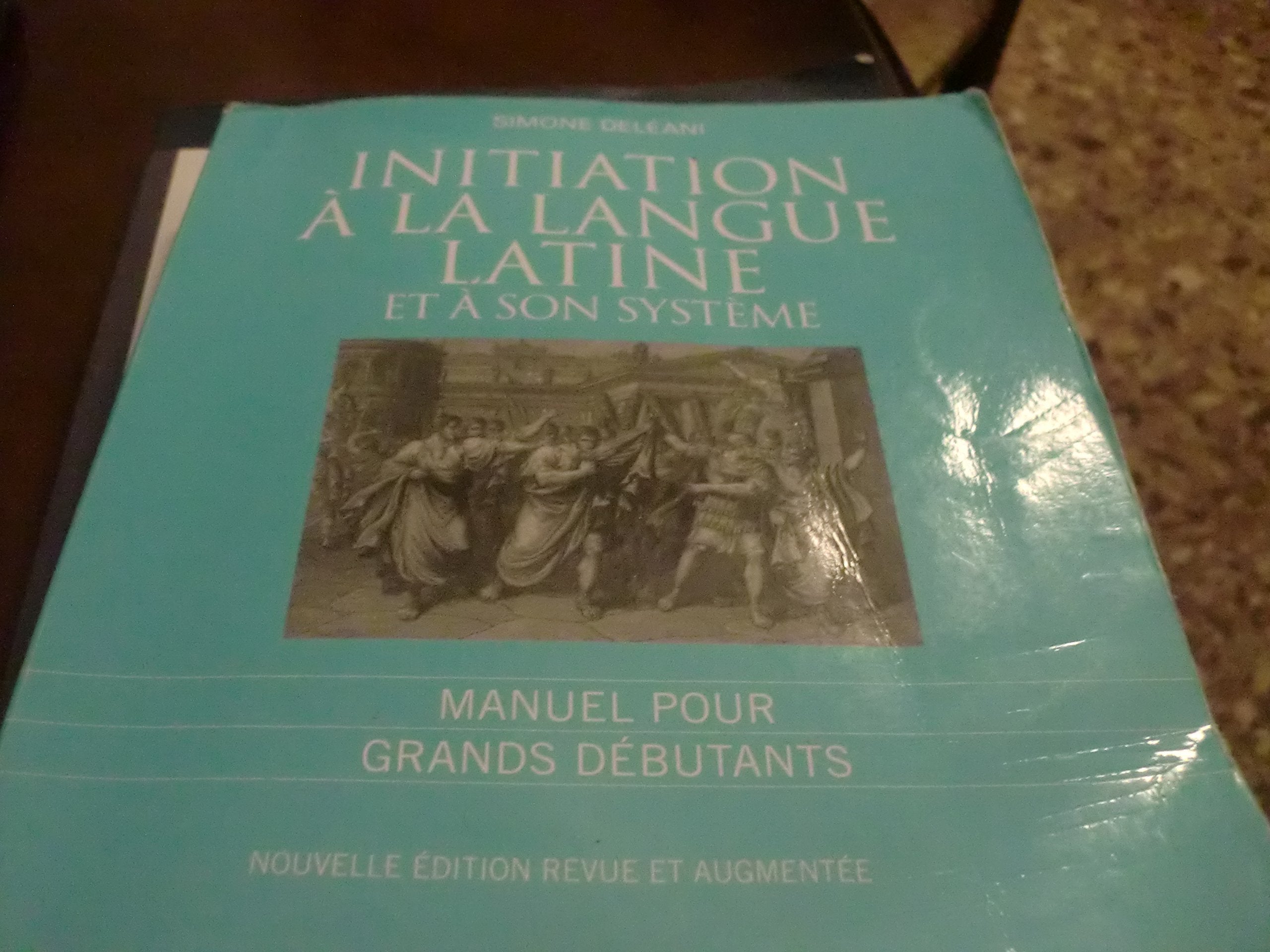 Initiation à la langue latine et à son système book