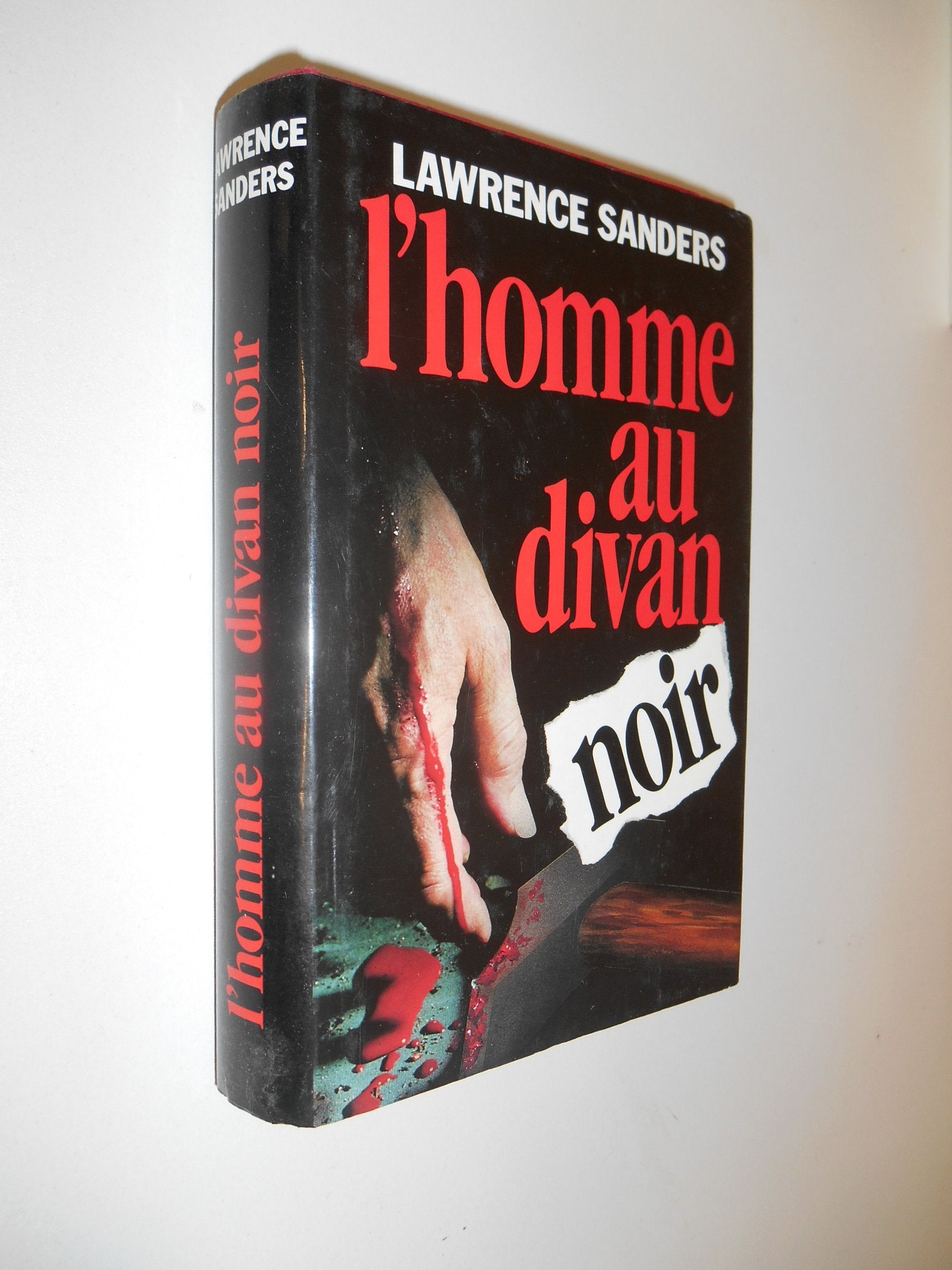 L'Homme au divan noir book