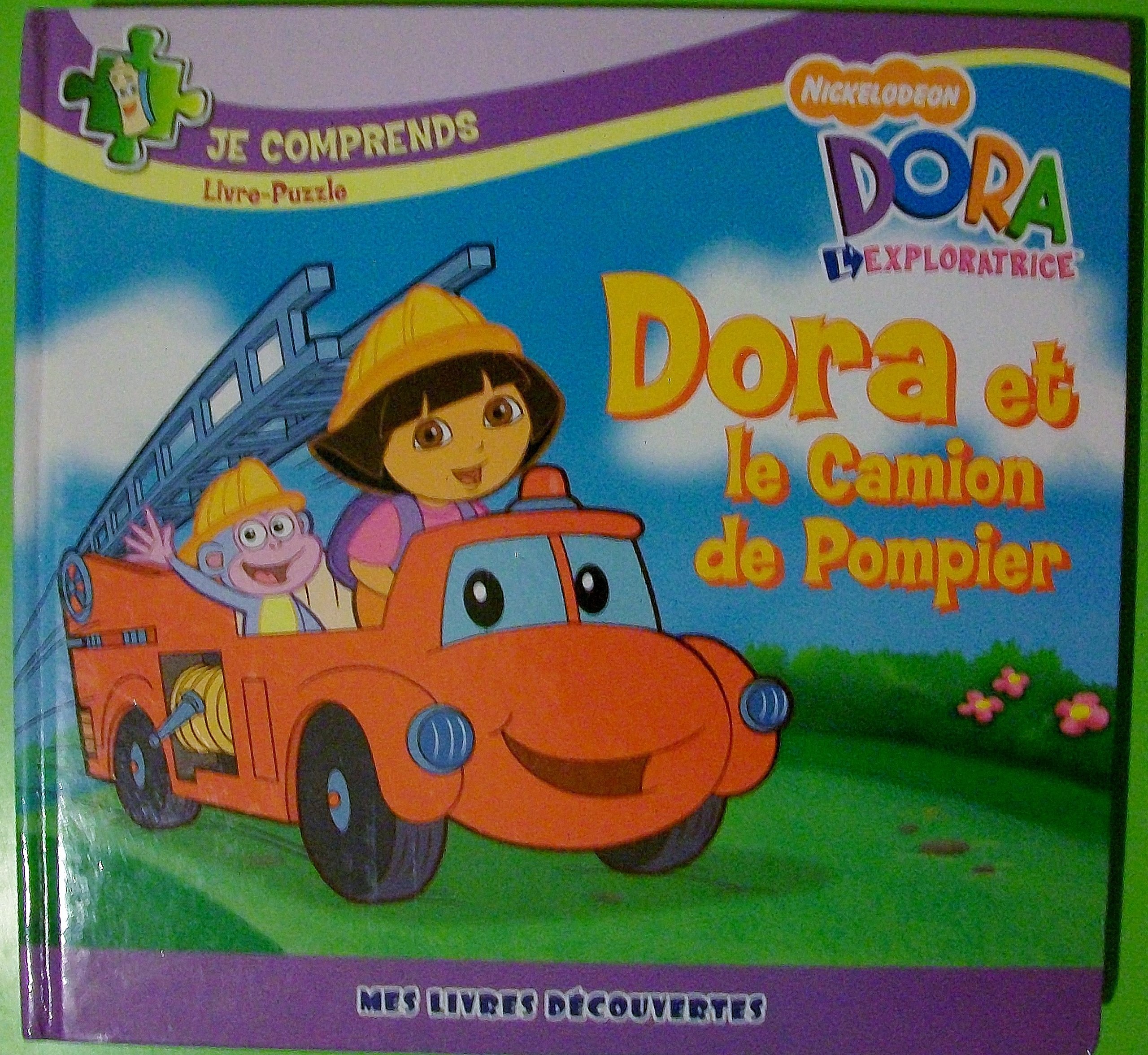 DORA ET LE CAMION DE POMPIERS - LIVRE PUZZLE book